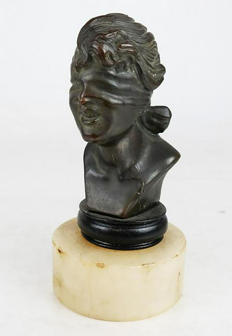Metal Blindfolded Bust: Metal blindfolded bust, on an alabaster base. [7 3/4" H x 3 3/4" W]. In good condition.