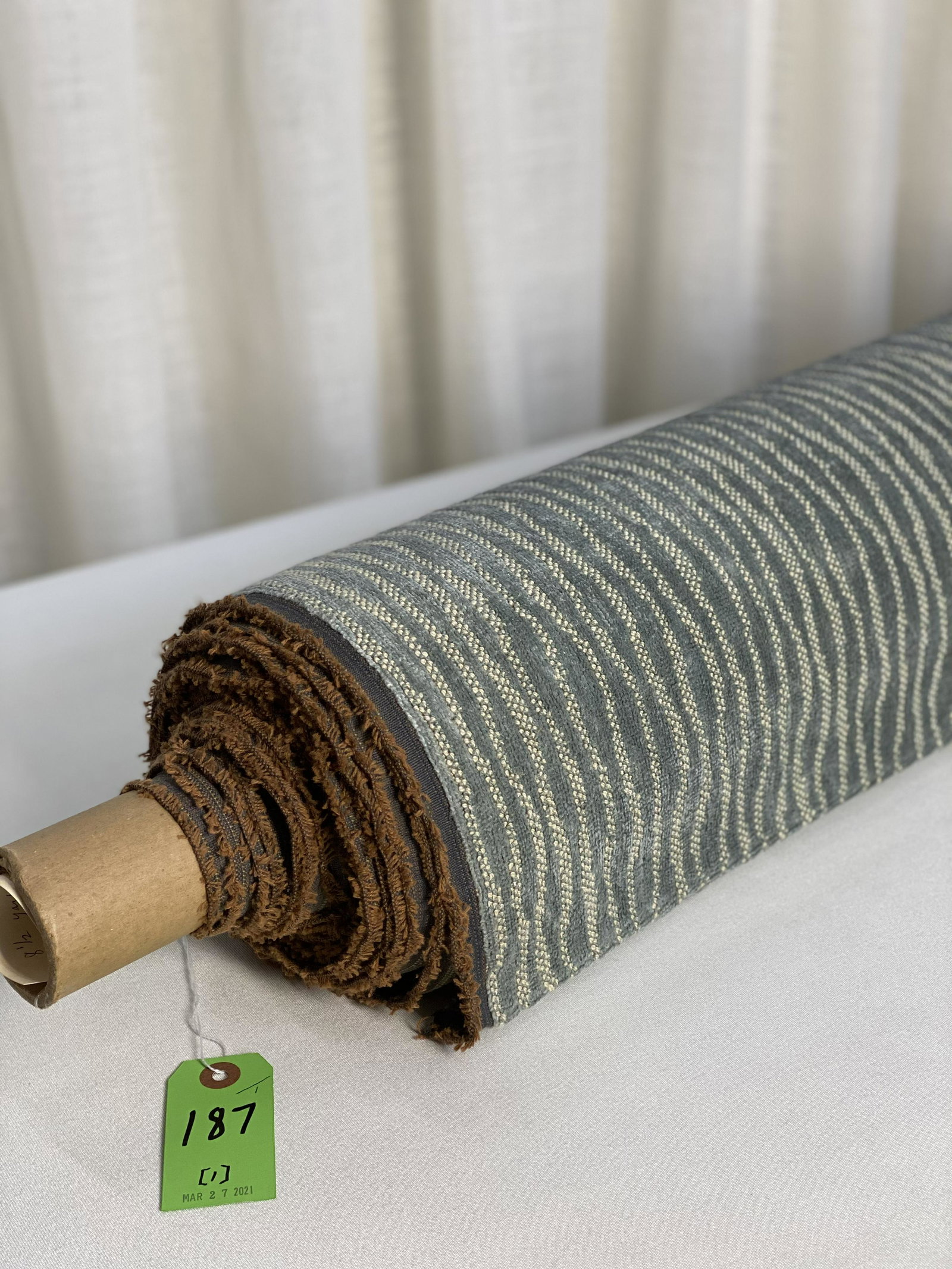 Blue & Ivory Linen Jacquard Velvet Fabric: 8 1/2 yards of a European woven French blue and ivory loop and cut, linen-faced figured jacquard velvet, approximately 53" wide. The linen face and cotton back combine to create a durable upholstery q
