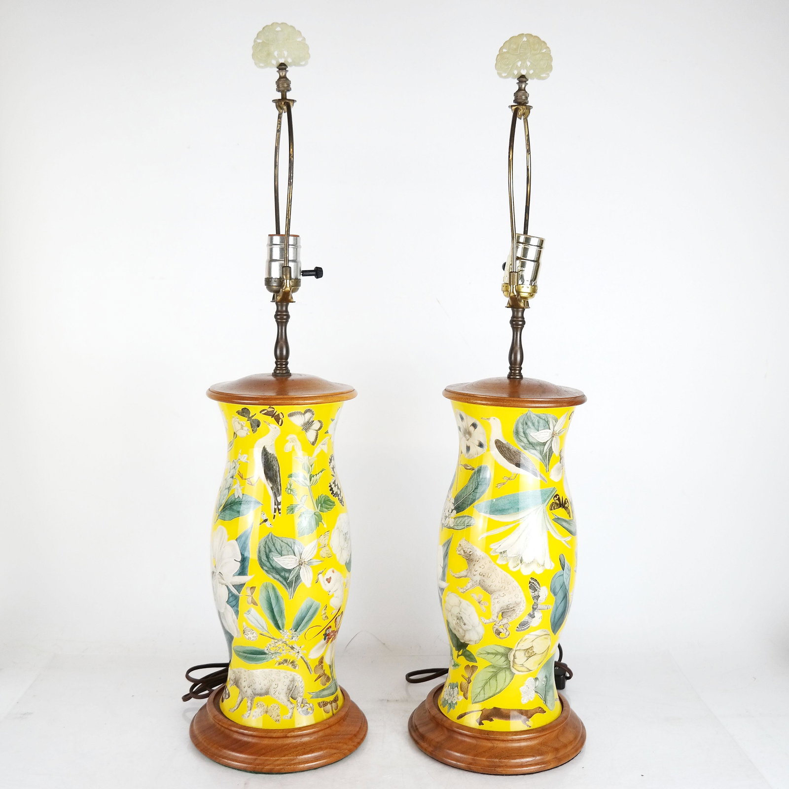 Pair Yellow Decorated Porcelain Lamps: Pair of lamps of yellow ground porcelain with aviary, jungle and floral decoration. [20 1/2" to socket]. In good condition.