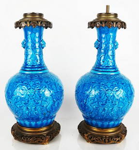 Pair Ormolu Mounted Faience Bottle Vases: Pair of ormolu-mounted Theodore Deck faience "Persian Blue" bottle vases, mounted as lamps, circa 1875, in the Chinese taste, molded with scrolling lotus flanked by fantastic beast mask handles suspen