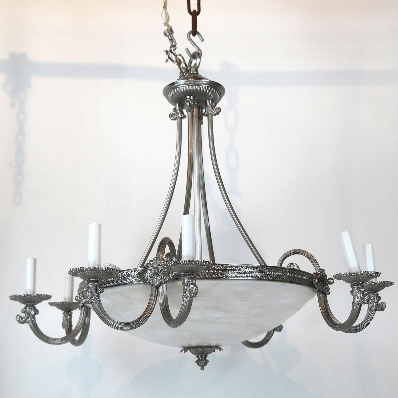 Silver Metal Chandelier with Dome Shade: 20th century silver metal chandelier with dome-form shade, holding 8 candle bulbs and 5 regular lightbulbs. [31" H x 32" Diam.]. In good condition; not tested.