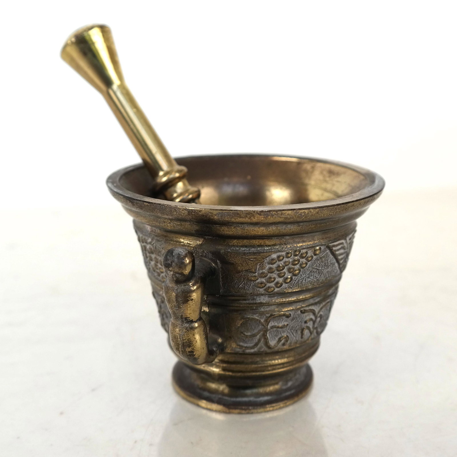 Bristol Munchen Mortar & Pestle: Bristol Munchen mortar and pestle, stamped on bottom. [5 1/2" H x 4" Diam.]. In good condition.