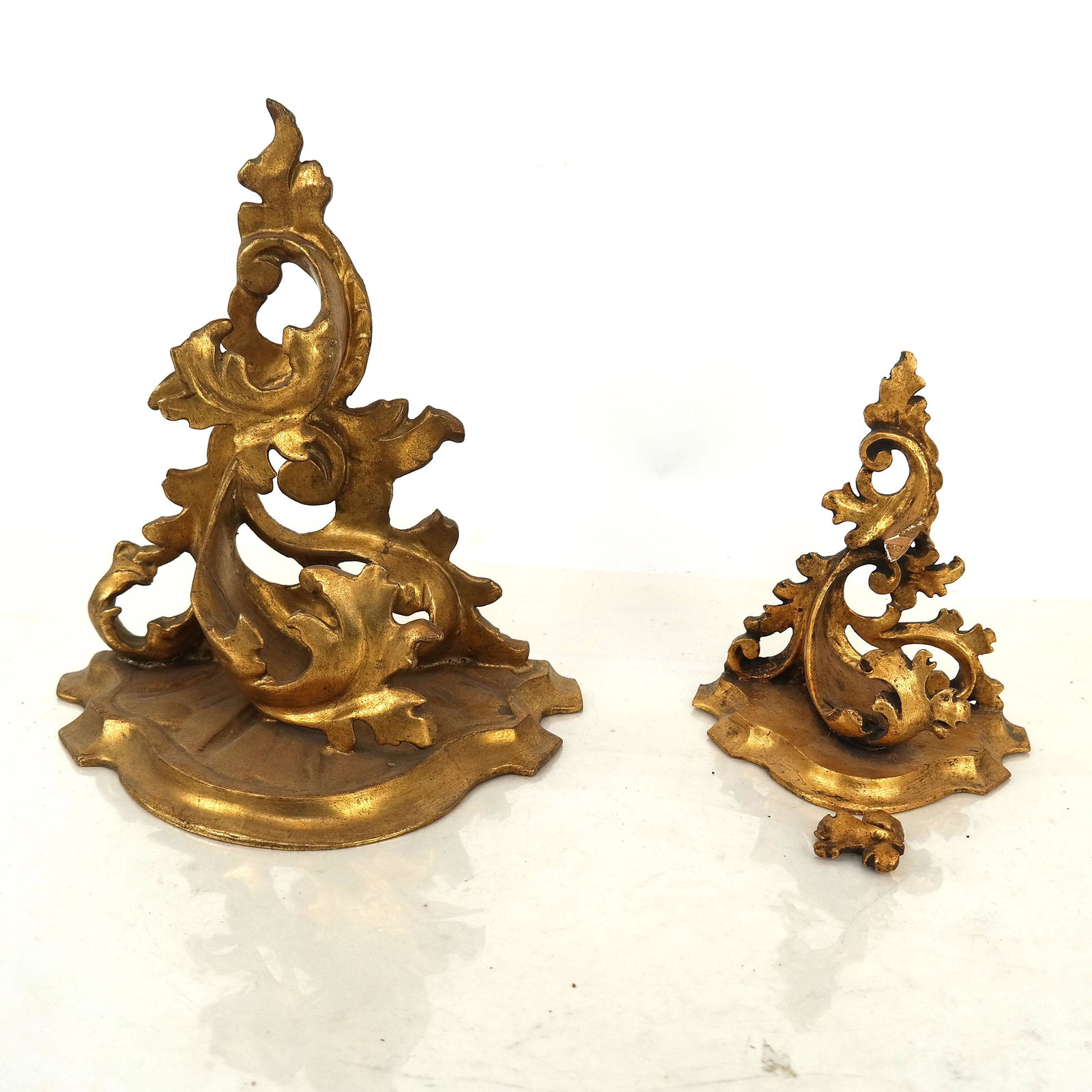 Two Giltwood Brackets: Two gilt wood brackets. [Larger: 10" H x 9" W x 5 1/2" D]. Smaller one in as-is condition.