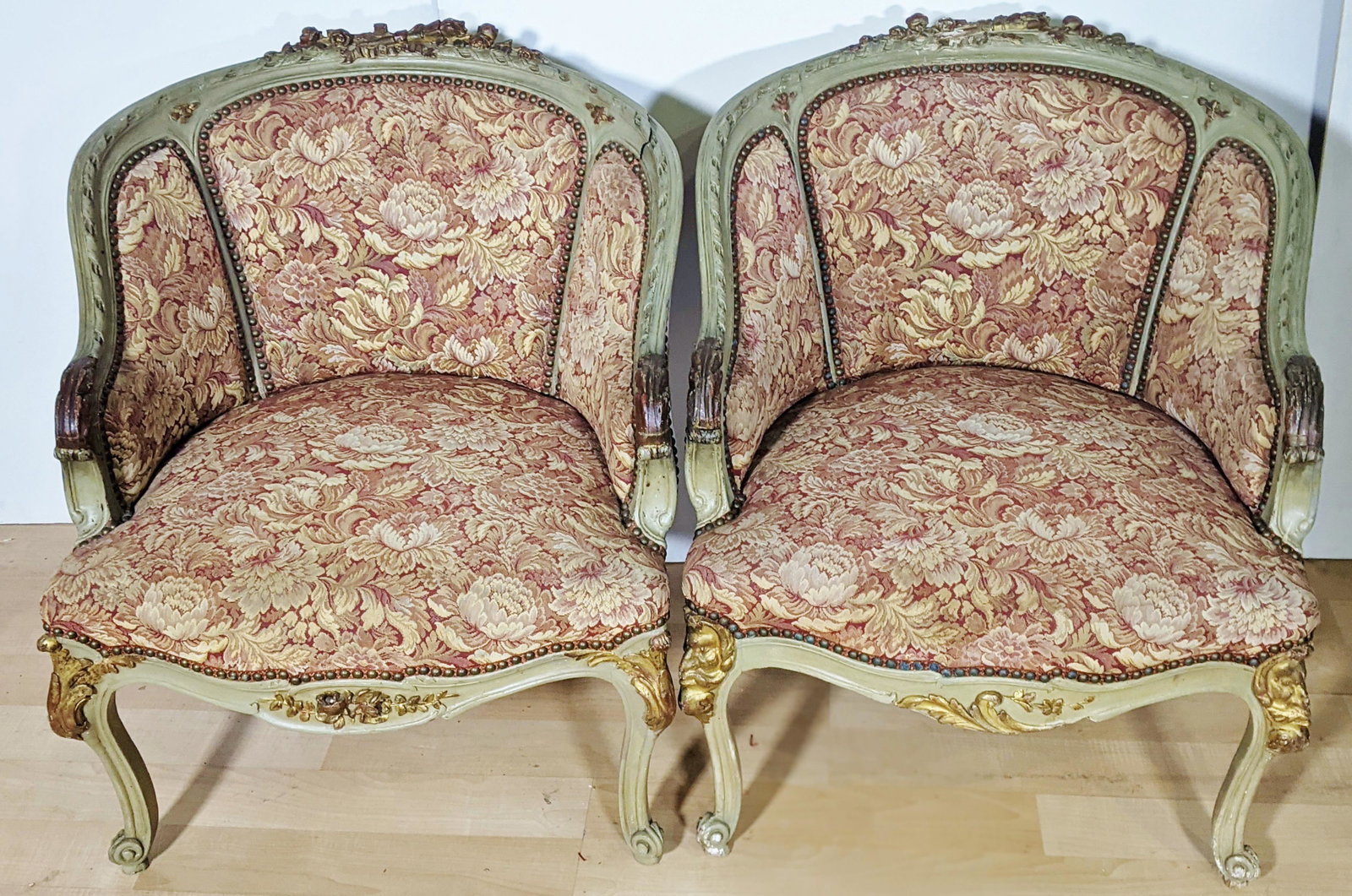 Matched Pair Louis XV Style Gilt Carved Arm Club Chairs: Pair Louis XV style Carved Gilt Wood Painted Arm Club Chairs. Size: 25”w x 30 ½’ h x 26”d.