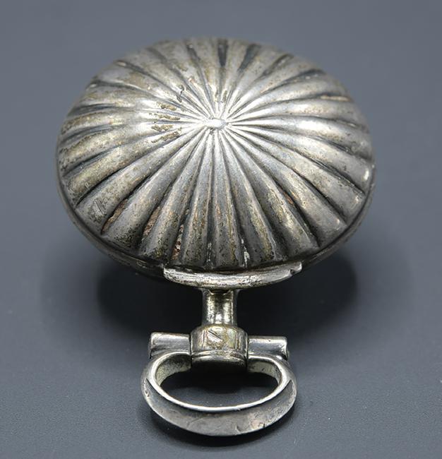 19th Century Silver Perfume Locket: Antique perfume locket from the 1800's crafted from silver with gold inlaying on the interior of the locket. Hundreds of years ago people would keep their scent on them at all times simply wafting the