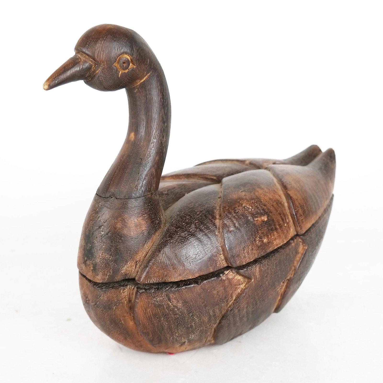 Rustic Carved Wood Duck-Form Container: Rustic carved wood duck-form container with swing top. Provenance: From the Upper East Side estate of a prominent NYC interior decorator. [11" H x 13" W x 7" D].