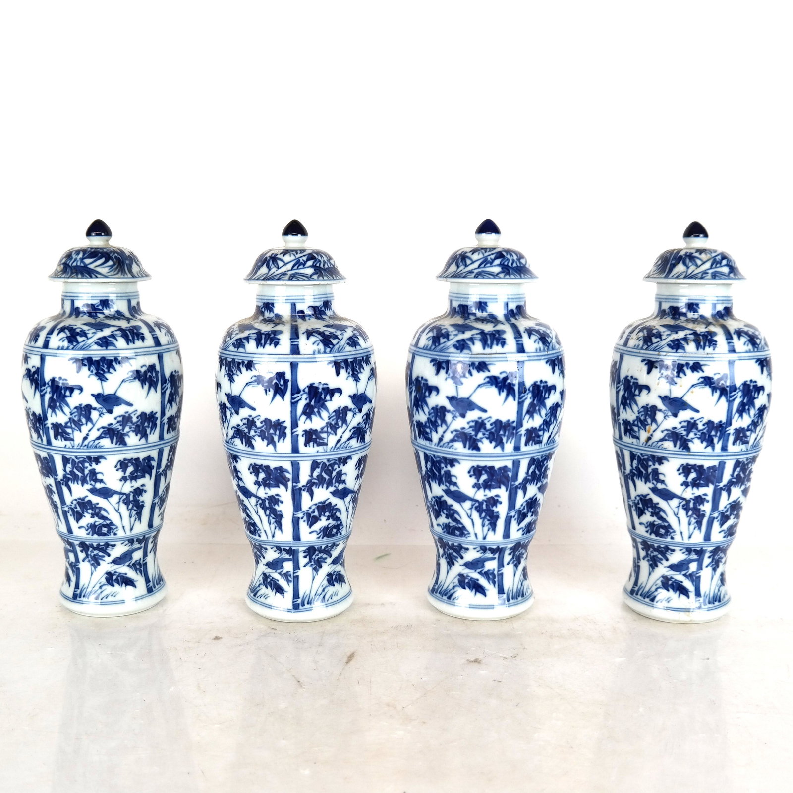 Set of 4 Mottahedeh Carved Jars: Small Historic Charleston reproductions. [10" H].