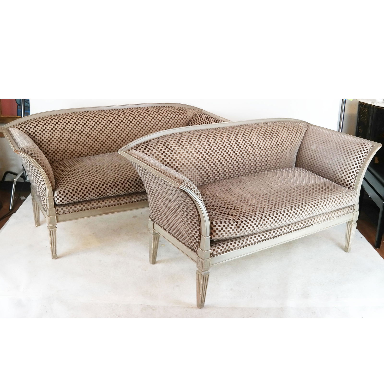 Pair French Painted Settees: Pair of Louis XVI-style with grey upholstered seats. [34" H x 62" W x 27" D; 19" to seat].