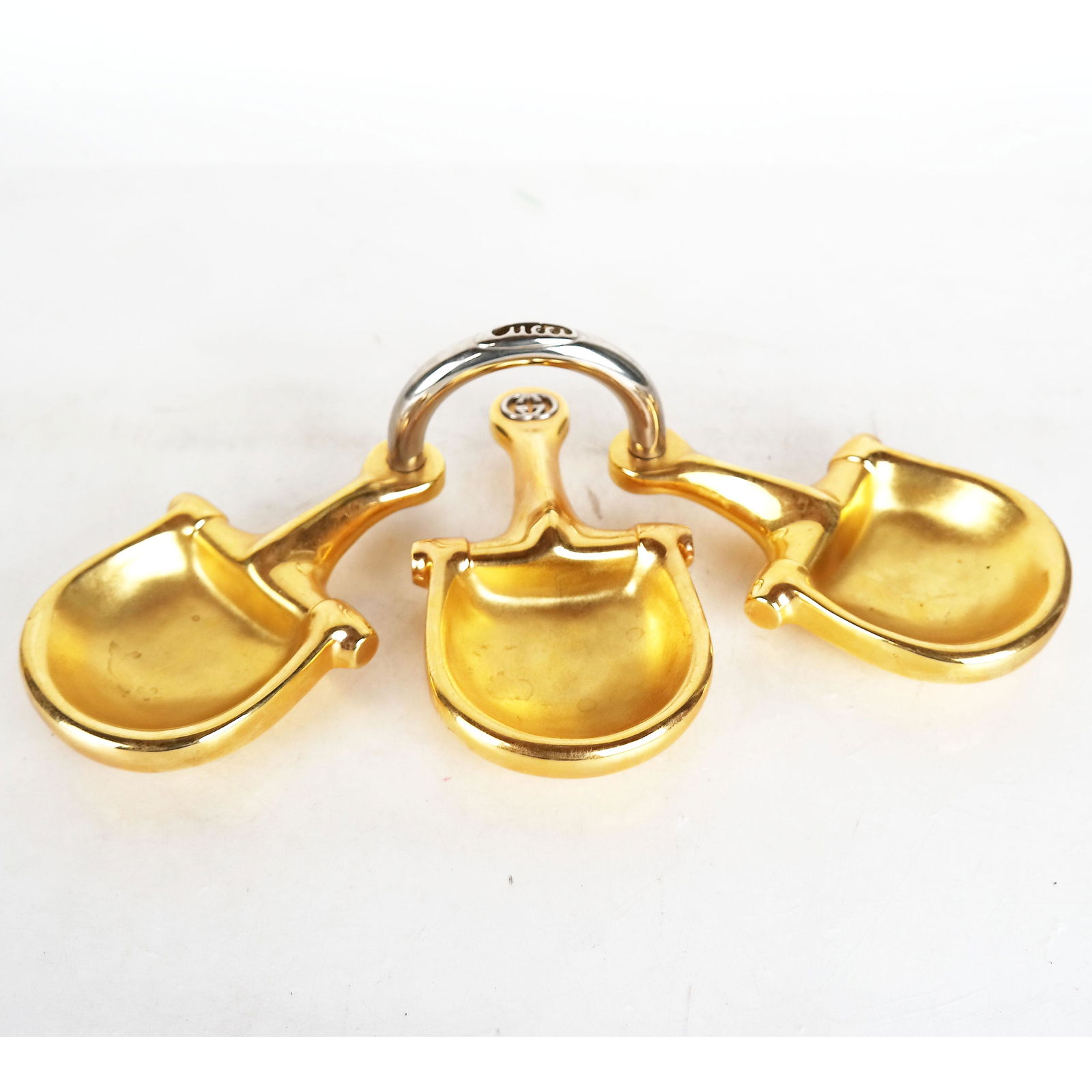 Three Gucci Gilt Brass "Stirrup" Catchalls (1 of 11)