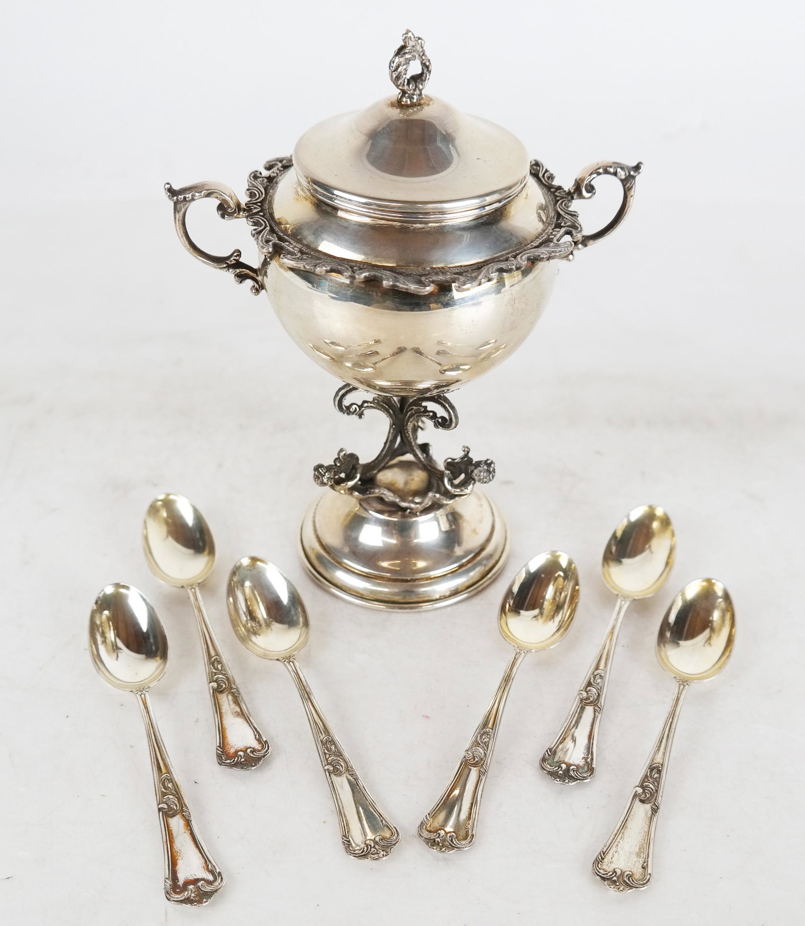 .800 Silver Suite of 6 Spoons & A Compote: Suite of 6 spoons, together with not matching compote having a figural base. 8.6 ozt,.