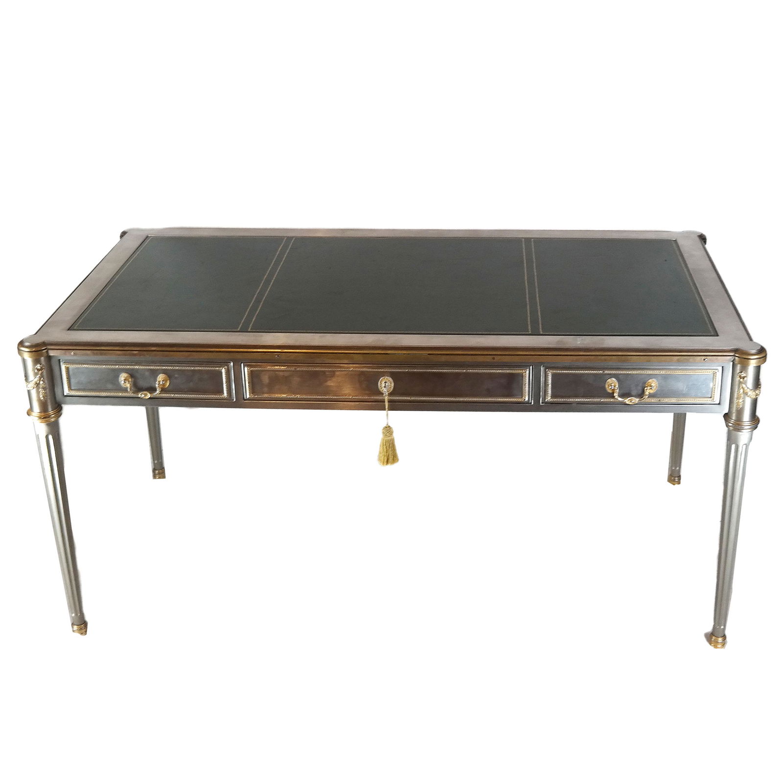 John Vesey Stainless Steel Neoclassical Desk: 1960s stainless steel and bronze Louis XVI / Neoclassical-style writing table / bureauplat desk designed by John Vesey (American 1924-1992), having gilt bronze trim with elegant fluted column supports
