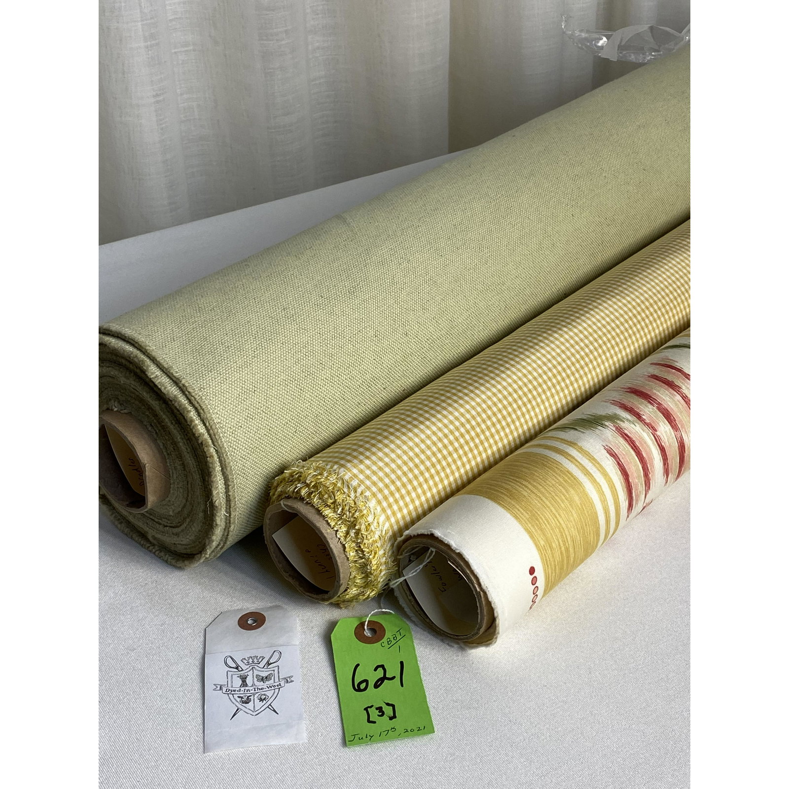 Colefax & Fowler, Scalamandre, Pindler Fabrics: 1) 1-3/4 yards of Colefax & Fowler's iconic "Antibes" 13-screen vertical Ikat-style printed cotton stripe, 54" wide. In golds, reds, greens and beige, the floral stripe has design repeats of 18" verti