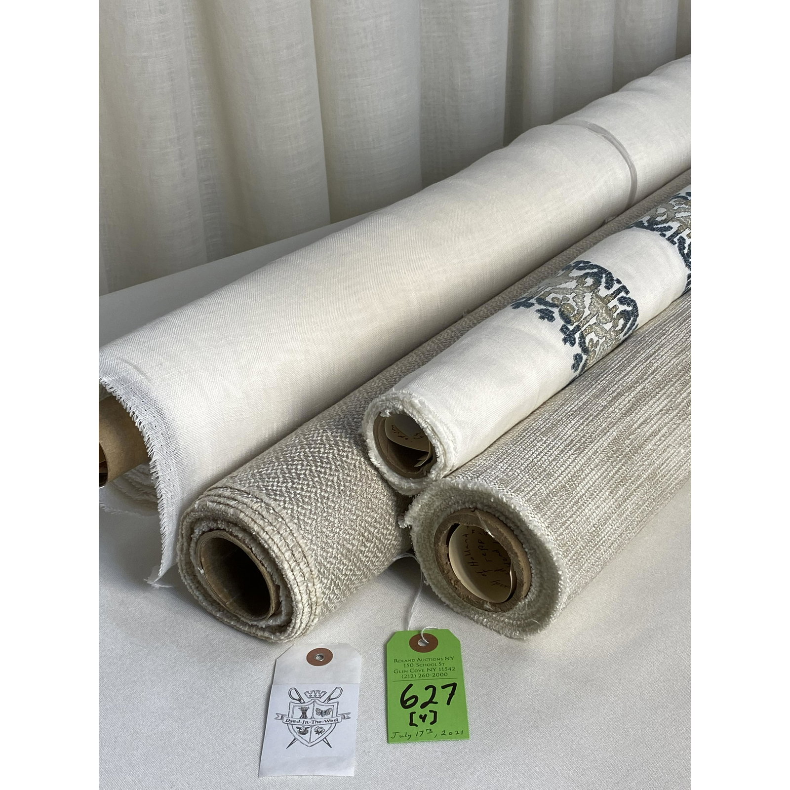 Cowtan & Tout, Holland & Sherry, Halpern Fabrics: 1) 1-1/2 yards of Cowtan & Tout's "Giselle Stripe" in "Patina", #11300-02, an embroidered white linen with top colors of Delft blue and ivories. The 53" wide textile has a design repeat of 4-1/4" vert