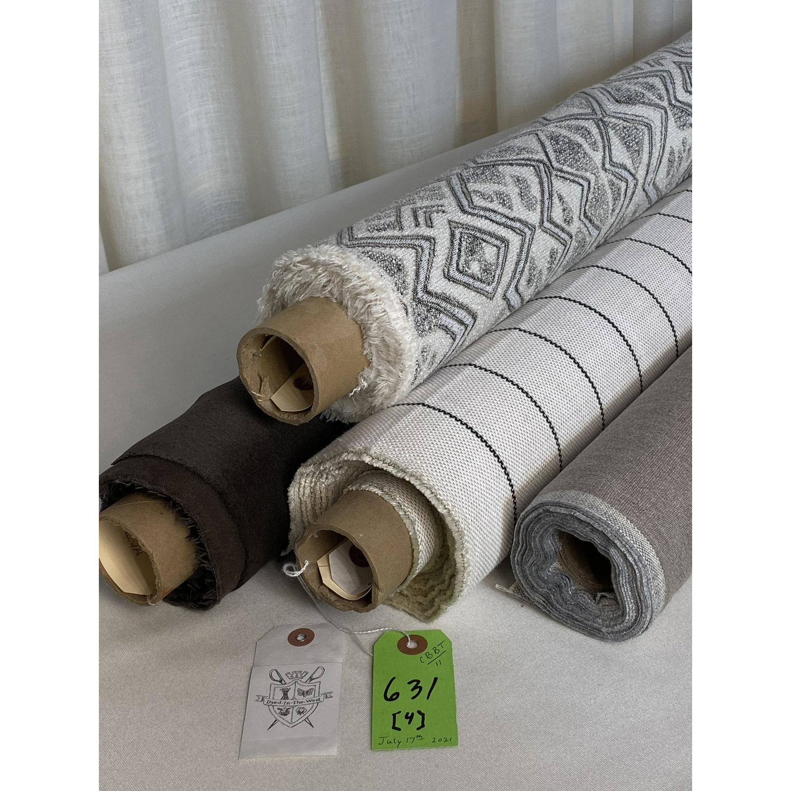 Nomi & Other Indoor/Outdoor Fabrics: 1) 6-1/2 yards of a handsome 2" wide warp stripe, color linen and anthracite, called "Rough Outline", in "Blanca", 54" wide. The solution-dyed acrylic upholstery stripe is flexible enough for curtains