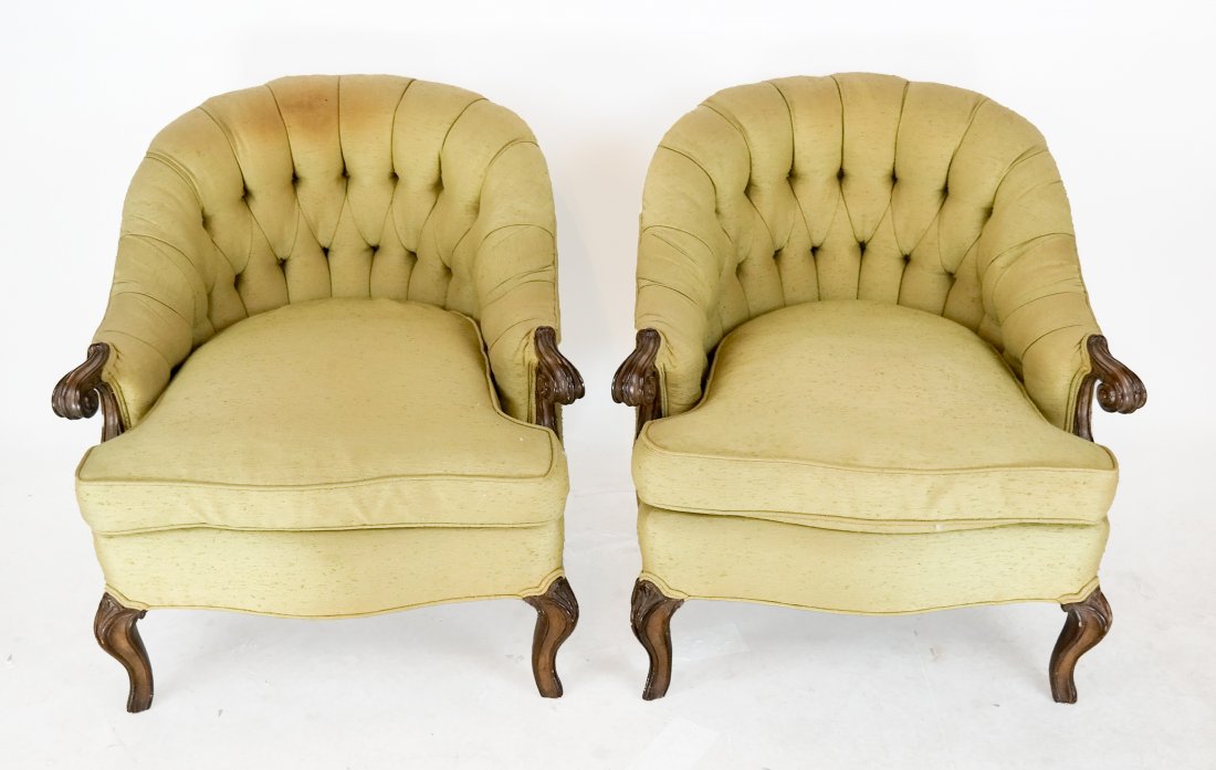 Pair of Georgian Furniture Co. Bergeres: Pair of Louis XVI-style walnut bergeres with green upholstery. [28" H x 28 1/2" W x 27" D; 16 1/2" to seat]. Worn.