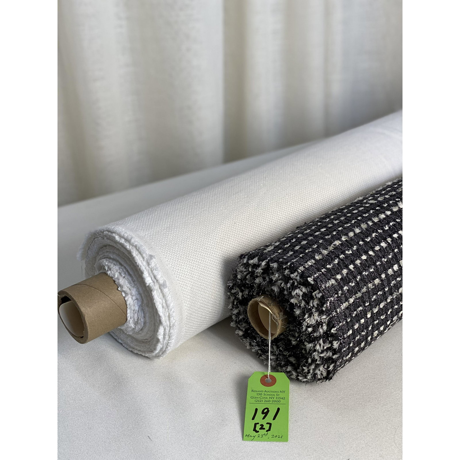 Black & White European Fabrics: 1) 7 1/4 yards of fashion-inspired upholstery in anthracite, off white and silver, 54" wide. In 3 lengths: 4 1/2 + 1 1/2 + 1 1/4 yards, secured to one tube. Article #27659. Some of the interlacings ar