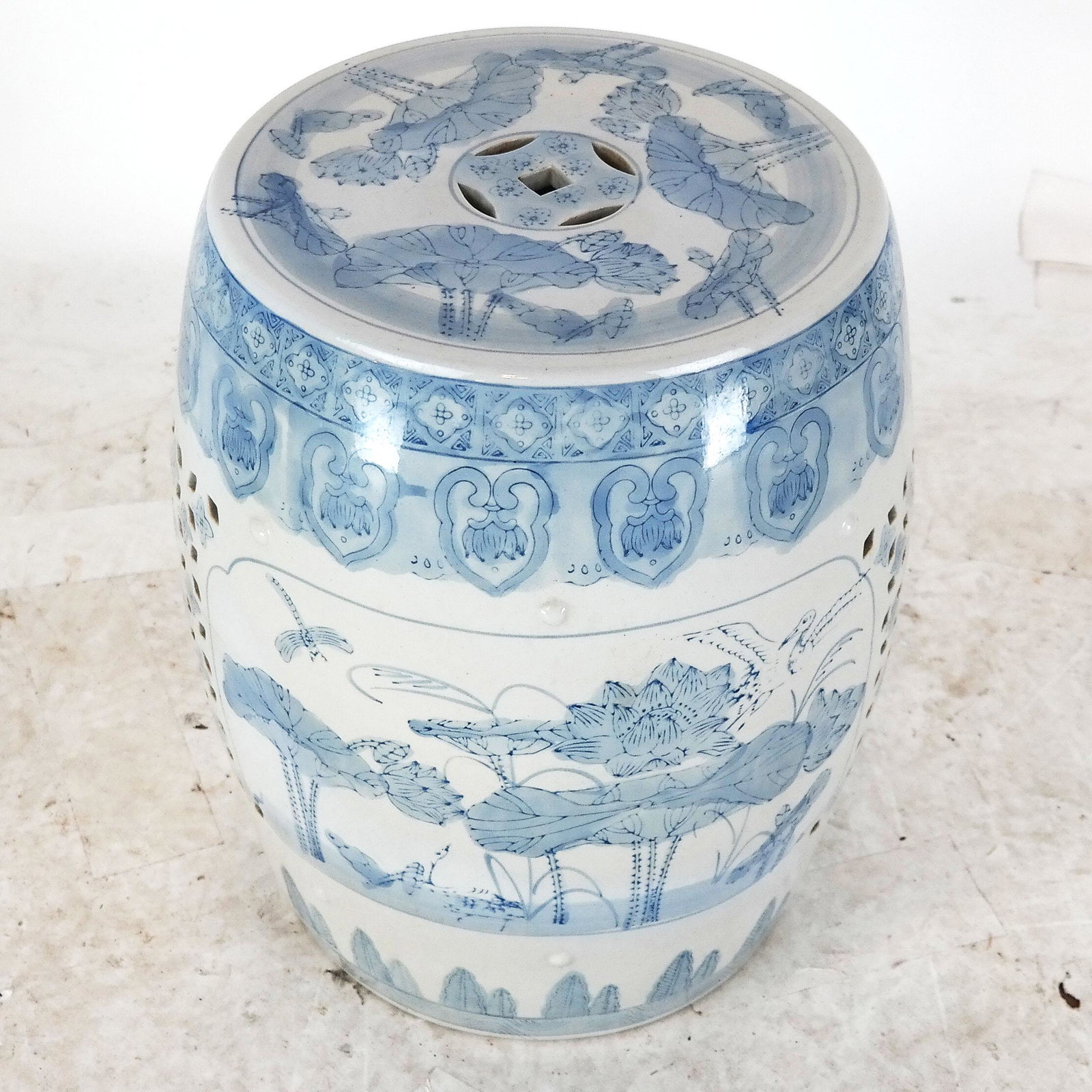 Chinese Porcelain Garden Barrel Seat: Chinese garden seat with scenic and openwork sides, with crow and dragonflies. [18" H x 14" Diam.].