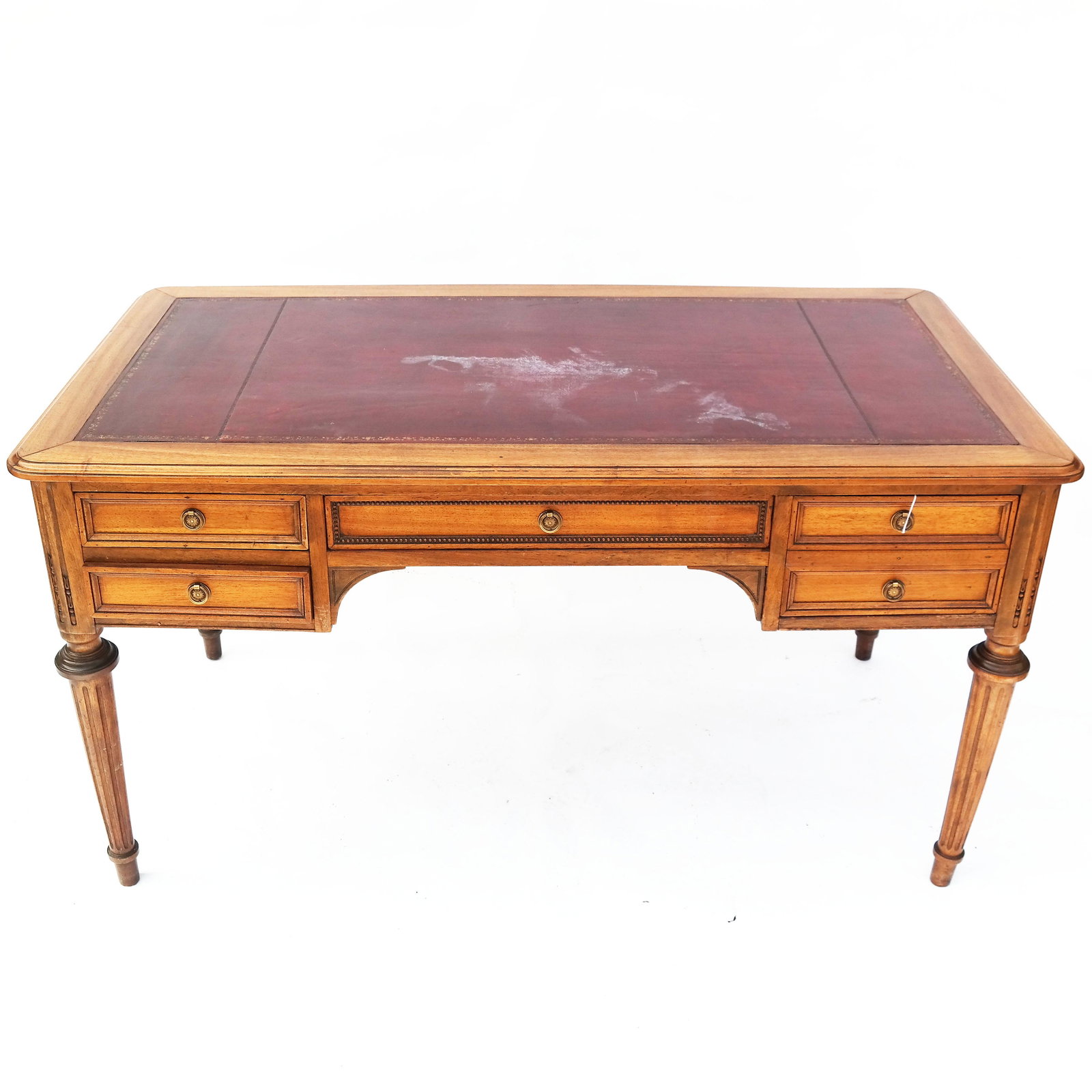 French-Style Oak Desk/Bureauplat: Louis XVI-style burgundy leather top desk. [29 1/2" H x 54 1/2" W x 29 1/2" D; 23 1/4" to apron].