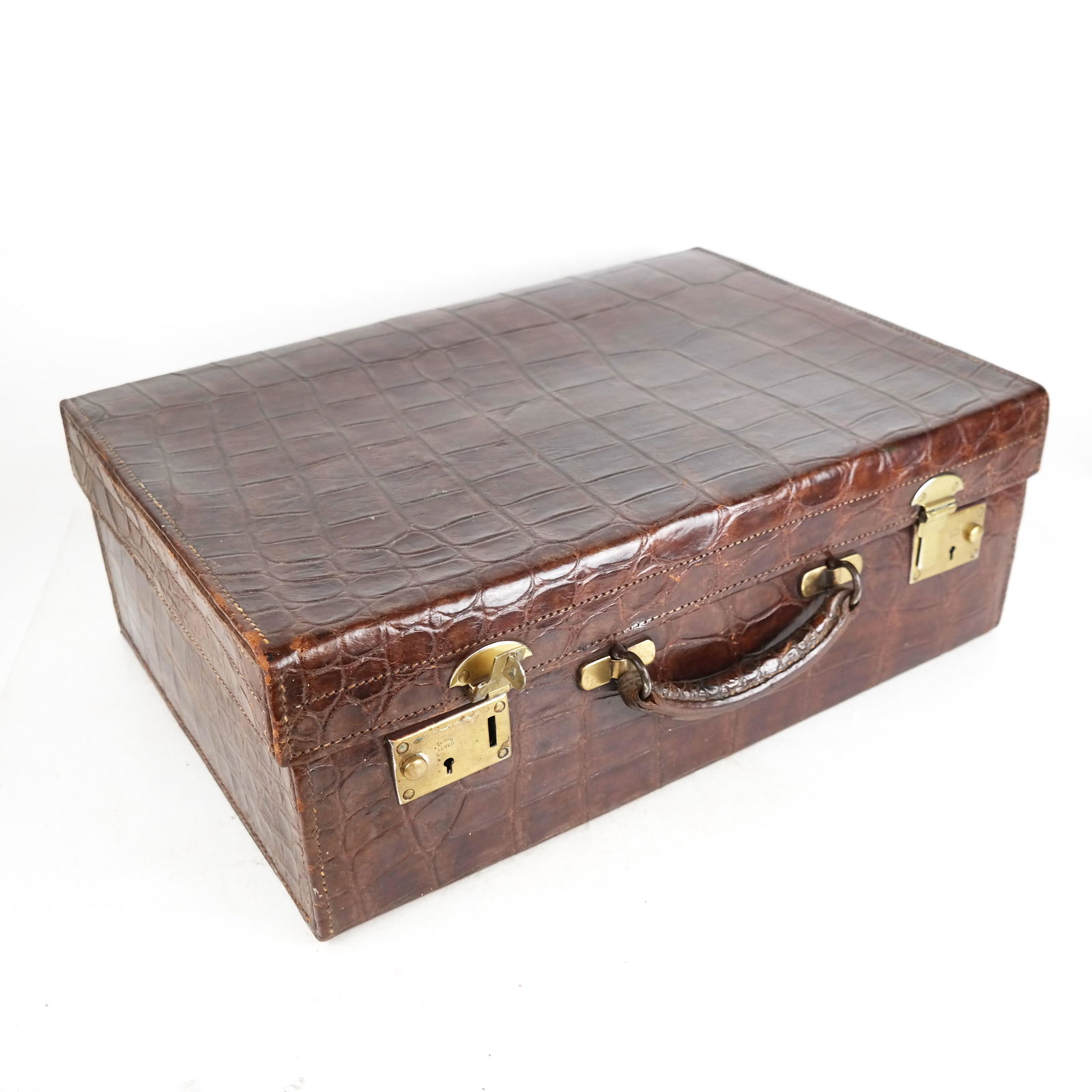 Mark Cross Tan Alligator Briefcase: Mark Cross tan alligator hard-sided briefcase suitcase. [7" H x 20" W x 16" D]. Interior in poor condition.