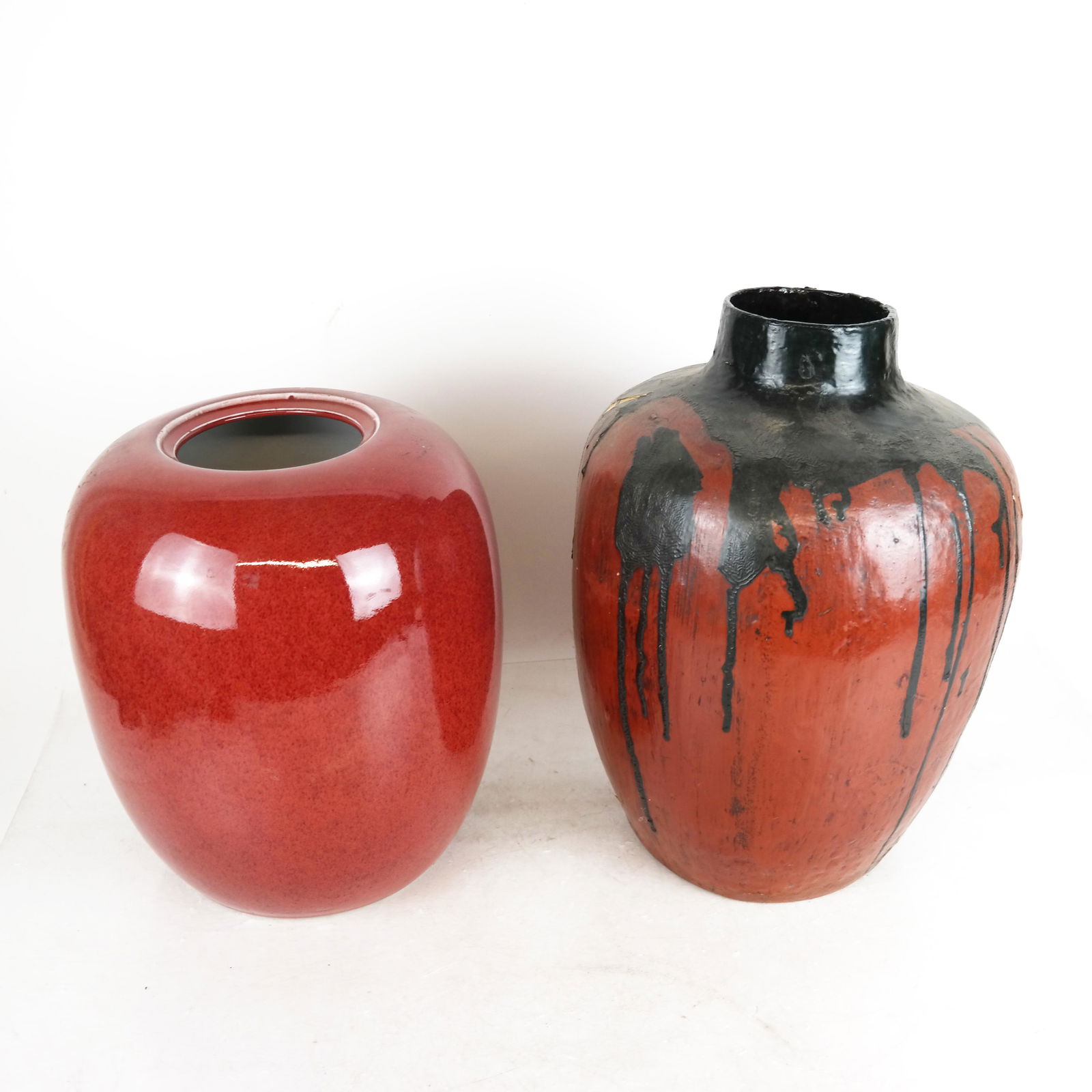 Two Vases: Chinese porcelain vase and painted papier mache vase. Provenance: From the Upper East Side estate of a prominent NYC Interior decorator. [14" H x 10" Diam.].