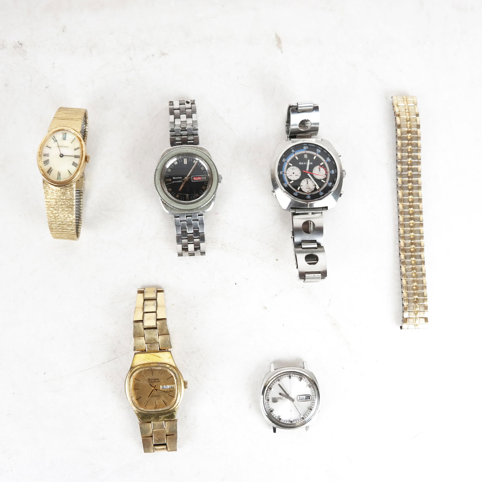 Five Assorted Wristwatches: Two Bulova, Seiko, Baylor, and Longines.