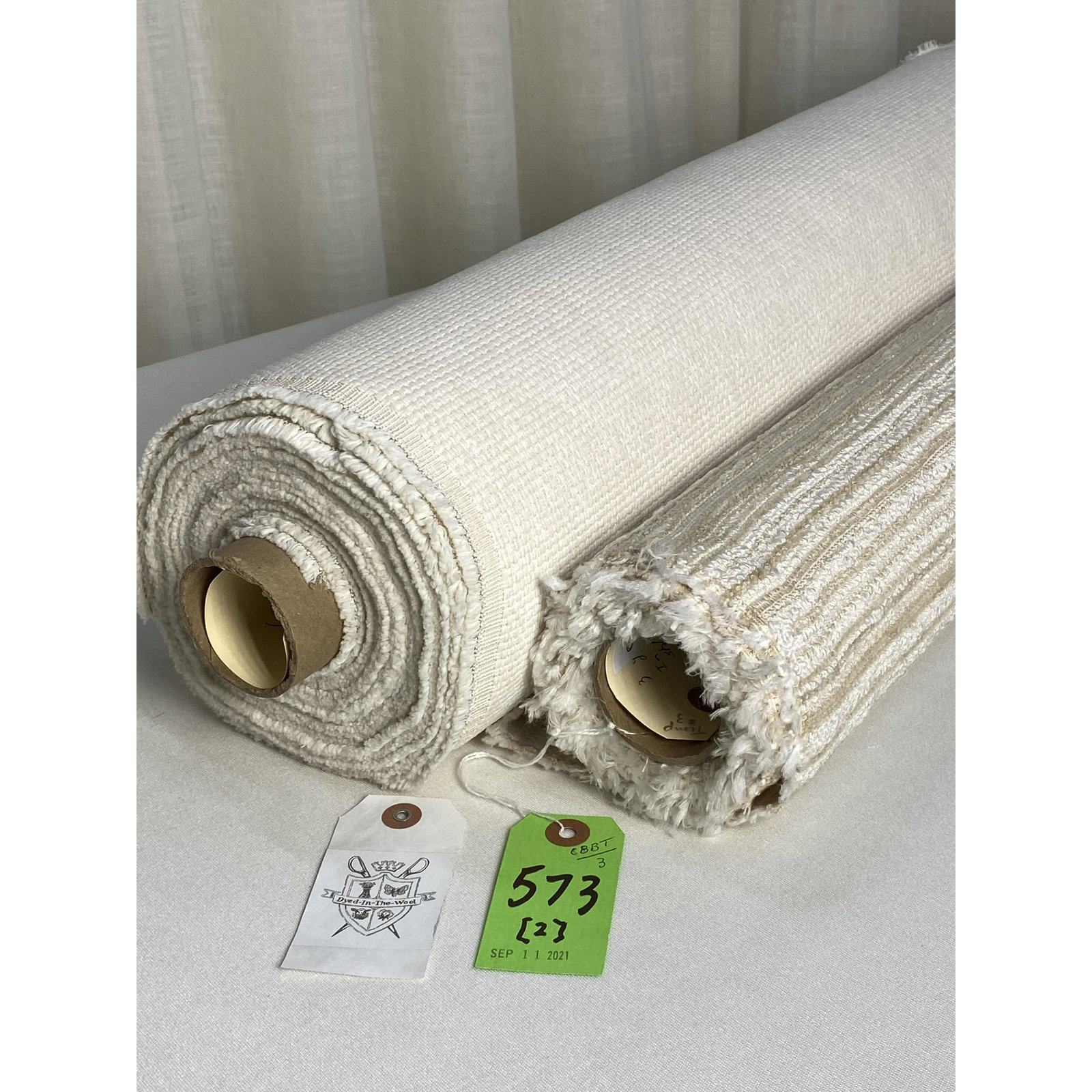 Donghia and Maria Flora In/Out Fabrics: 1) 3 yards of Donghia's in/out solution dyed acrylic performance horizontal stripe, item #200405, 56" wide. The chenille and boucle upholstery, in tan and white, has a 7 3/4" vertical repeat. 2) 12 ya