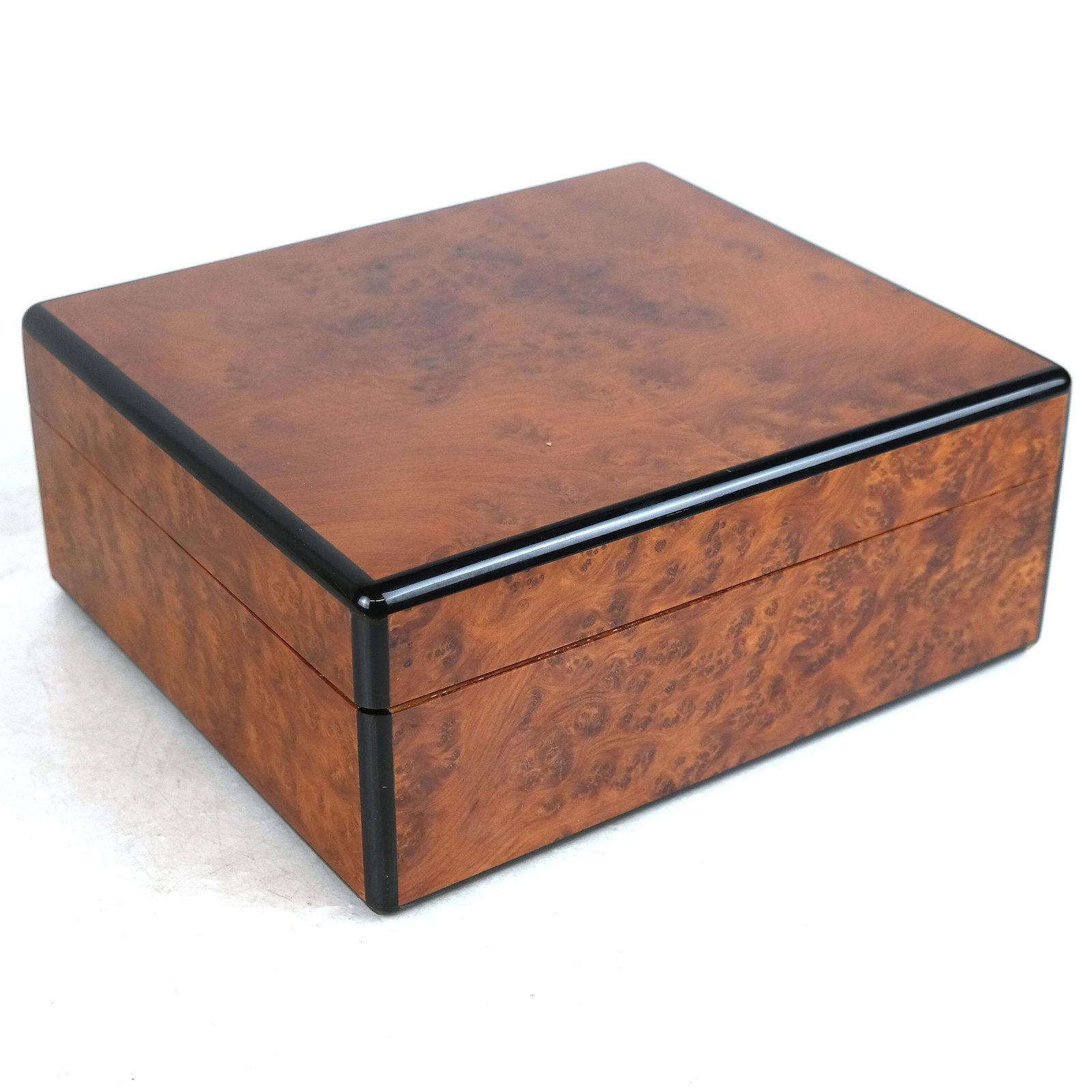 Elie Bleu, Paris Burlwood Humidor: Burlwood humidor by Elie Bleu, Paris. [4" H x 15" W x 9 1/4" D].