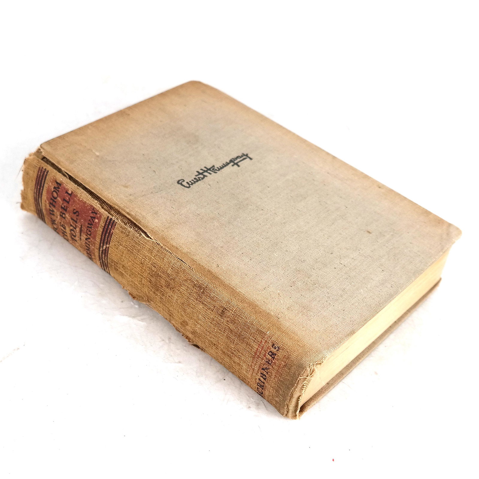 BOOK: Ernest Hemingway "For Whom The Bell Tolls": 1940 Scribners edition of "For Whom The Bell Tolls", inscribed "To Alan and Irene / Good Luck / Ernest Hemingway". [8 1/2" H x 5 3/4" W]. Cloth cover torn.