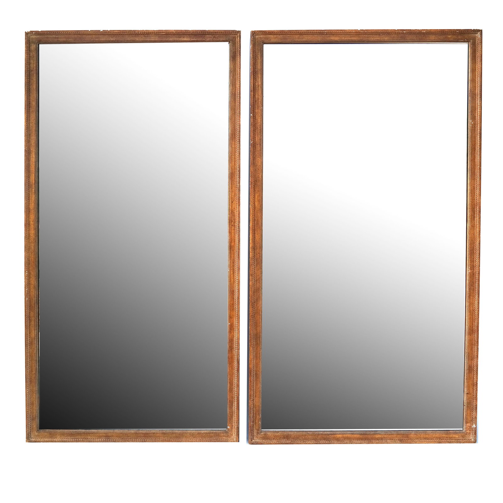 Pair of Painted and Gilt Pier Mirrors: Pair of painted and gilt pier mirrors. Provenance: Estate of Roger Prigent - Malmaison. [63" H x 32 1/4" W]. Chips to frames.