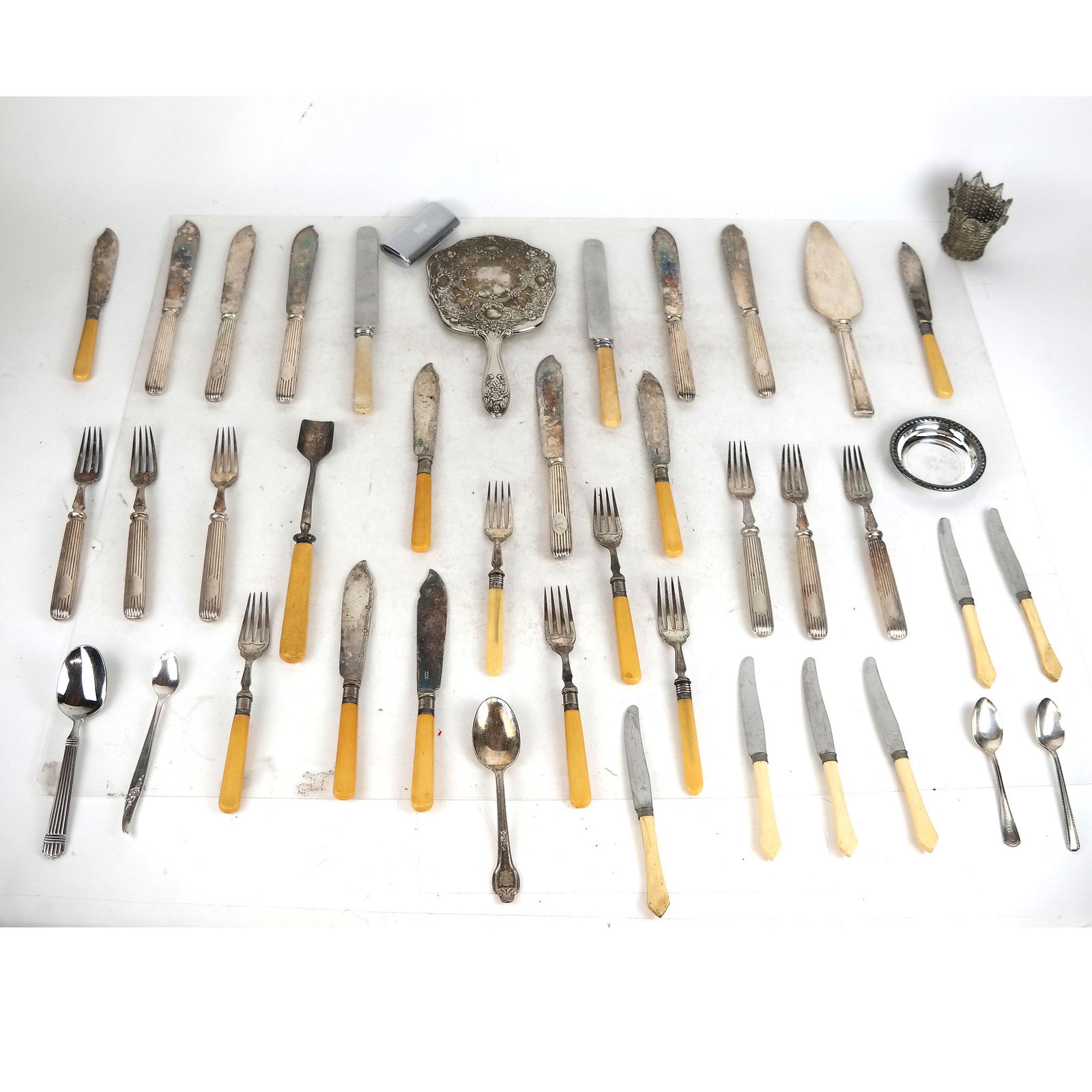 Silver Plate Lot: Mappin & Webb, Fish Set, More: Lot includes 12 pieces of Mappin & Webb flatware, a 5-pc bone-handled fish set plus 9 knives, assorted serving pieces and flatware, a hand mirror, trinket dish, basket and lens holder. [Mirror: 9 1/4"