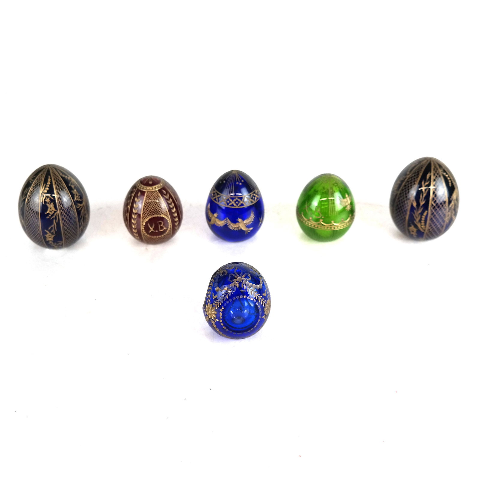 Group of 6 Russian Eggs: St. Petersburg handiwork. [Tallest: 2 7/8" H]. In good condition.