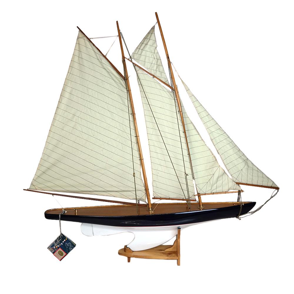 Two-Masted Wood Pond Yacht: Two-masted pond yacht, in classic racing boat shape, with hand stitched cotton sails. Hand constructed, plank on frame; comes with assembling instructions. For decorative use only. [40 3/4" H x 44 1/2