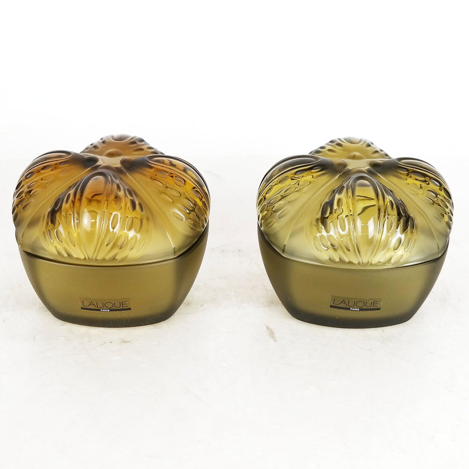 Pair Lalique France Crystal Jars: Pair of Lalique, France crystal jars. [3" H x 4" W].