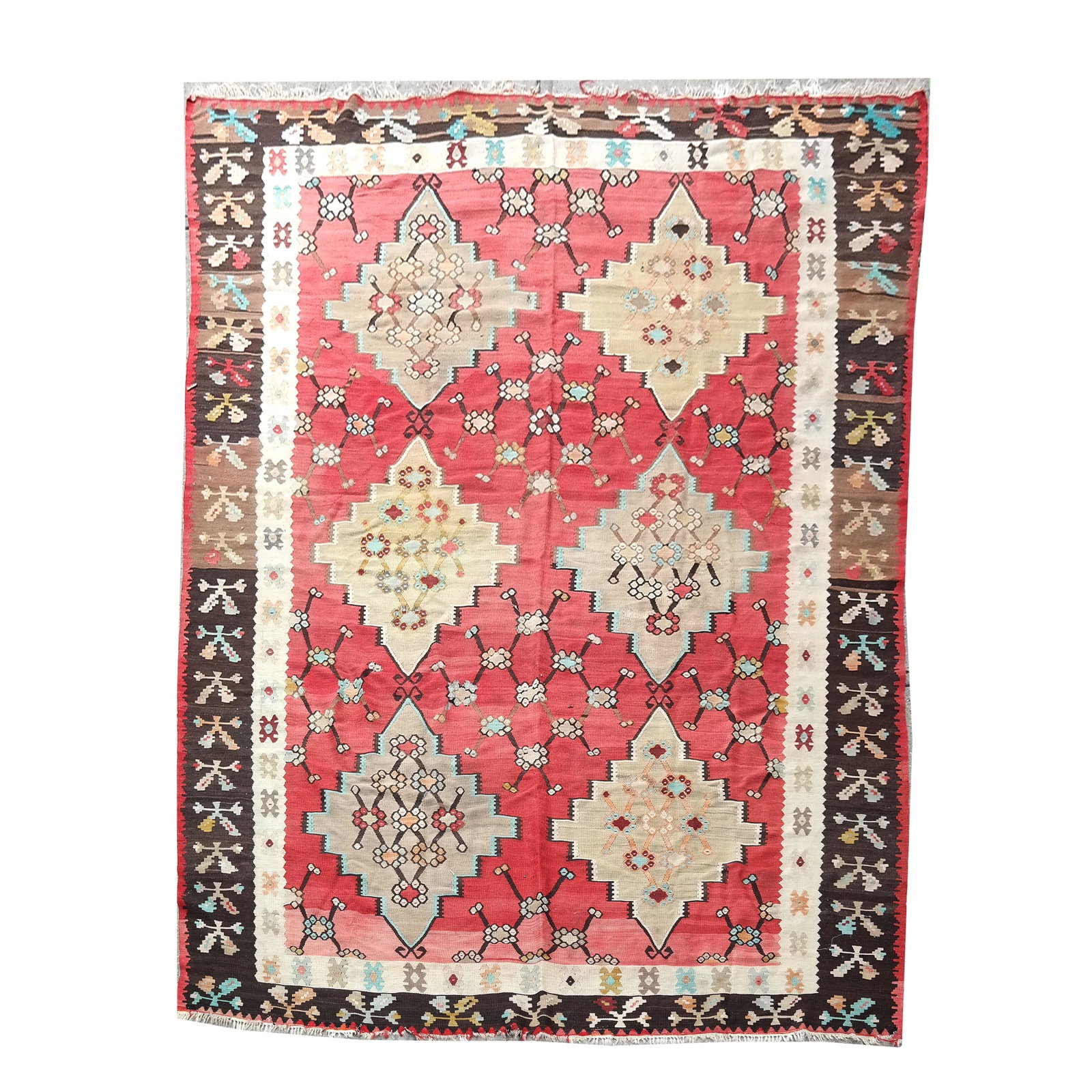 Kilim Rug: Kilim rug. [130" x 91"]. Center repaired in 3" x 3" area.