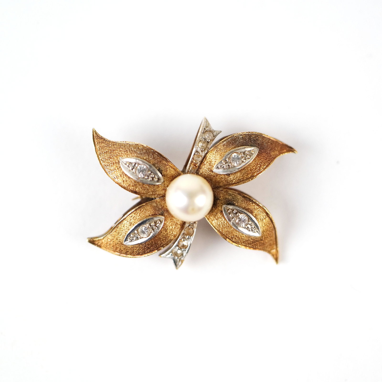 14K Gold, Pearl Solitaire & Diamond Pin: 14K yellow gold, pearl solitaire and diamond pin (diamond not weighed). 5.1 dwt. inclusive. 20th century, American. In good condition.
