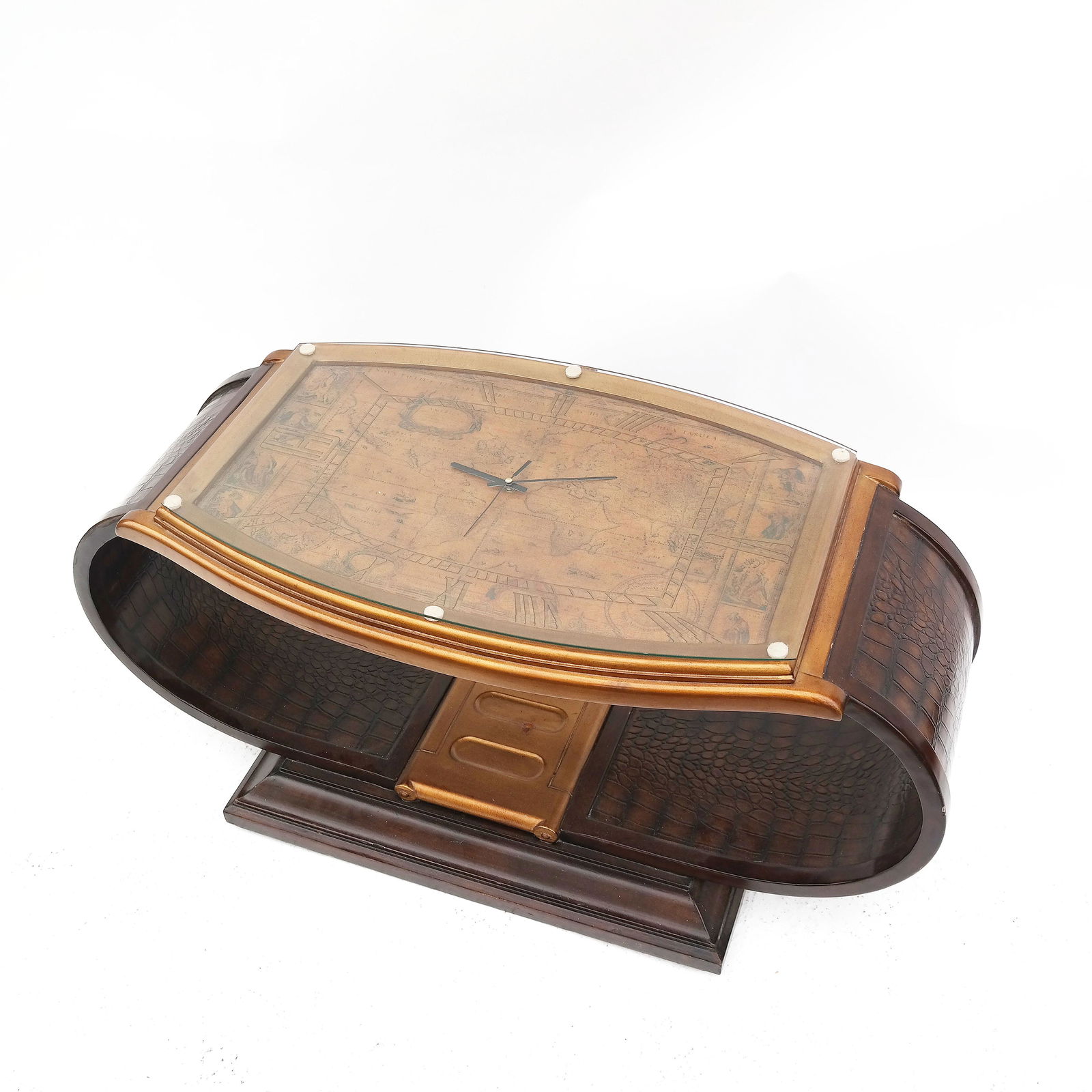 Watch-Form Whimsical Coffee Table: Whimsical watch-form coffee table, the top with a world map and inset clock, raised on watchband motif supports. [20" H x 41" W x 20" D]. Wear and losses.