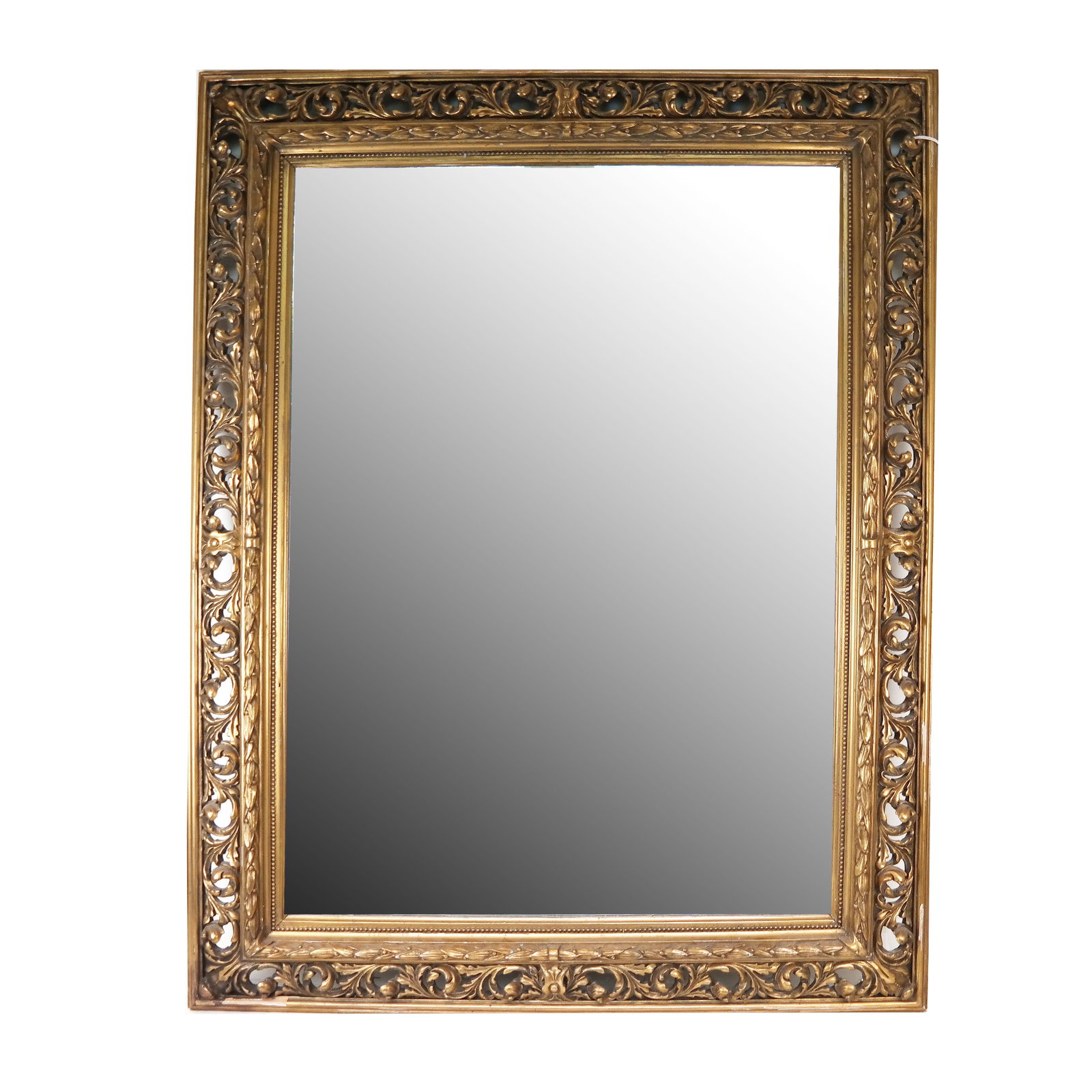 Rococo-Style Giltwood Mirror: Rococo-style giltwood mirror, of scrolling design with berry borders. [43" H x 34" W x 2" D]. Losses to gilt decoration.