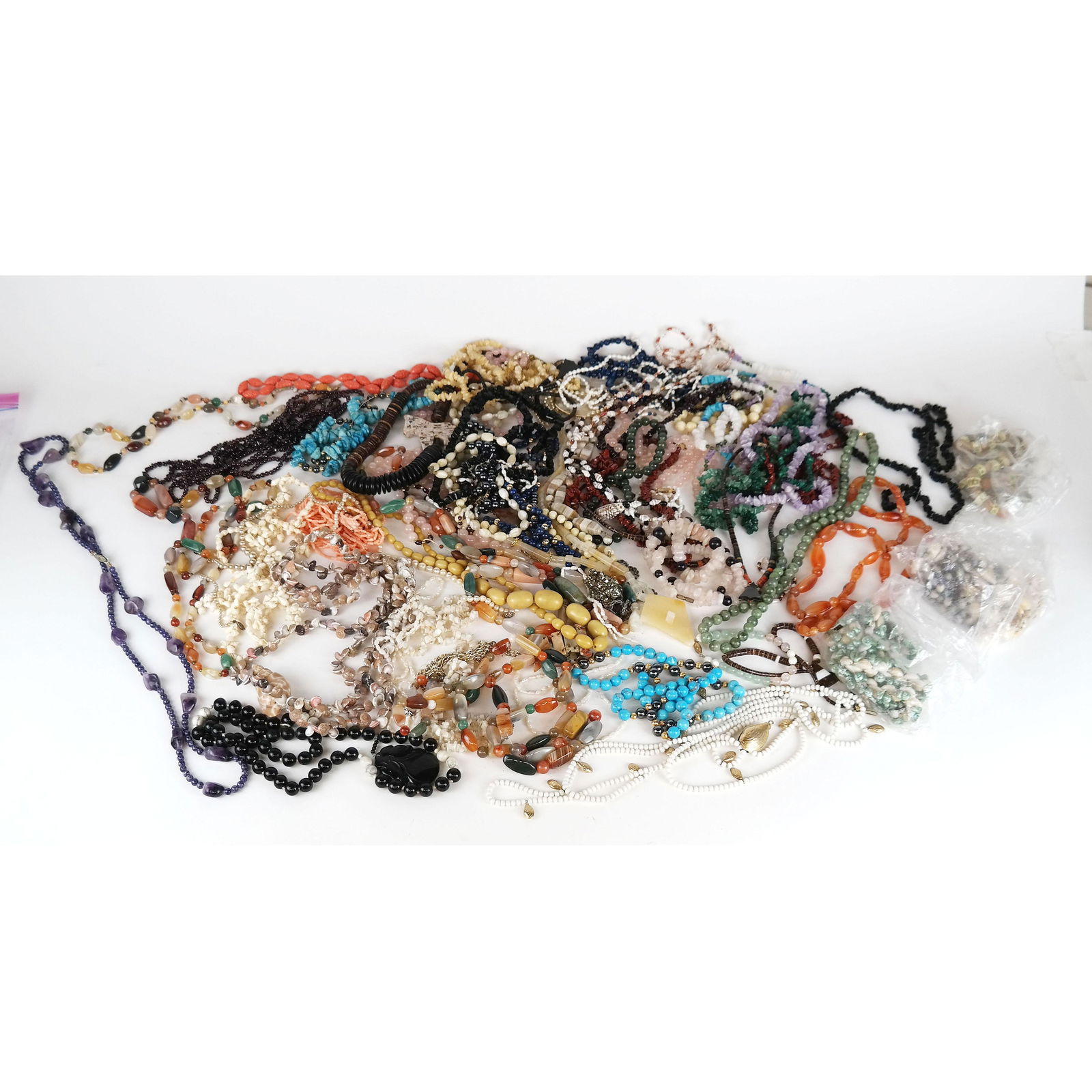 Vintage Hardstone, Pearl & Coral Necklaces: Lot of approximately 40 necklaces includes quartz, amethyst, jade, malachite and others. In generally good condition.