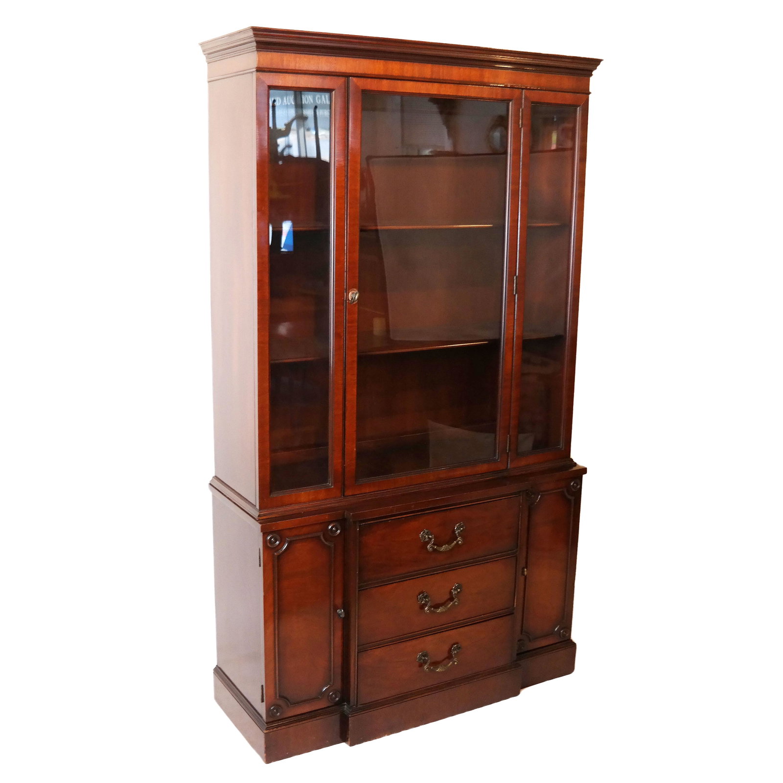Two-Part Mahogany Cabinet: Two-section Hepplewhite-style bookcase, having a door in top with three drawers below. [76" H x 42 1/2" W x 14" D].