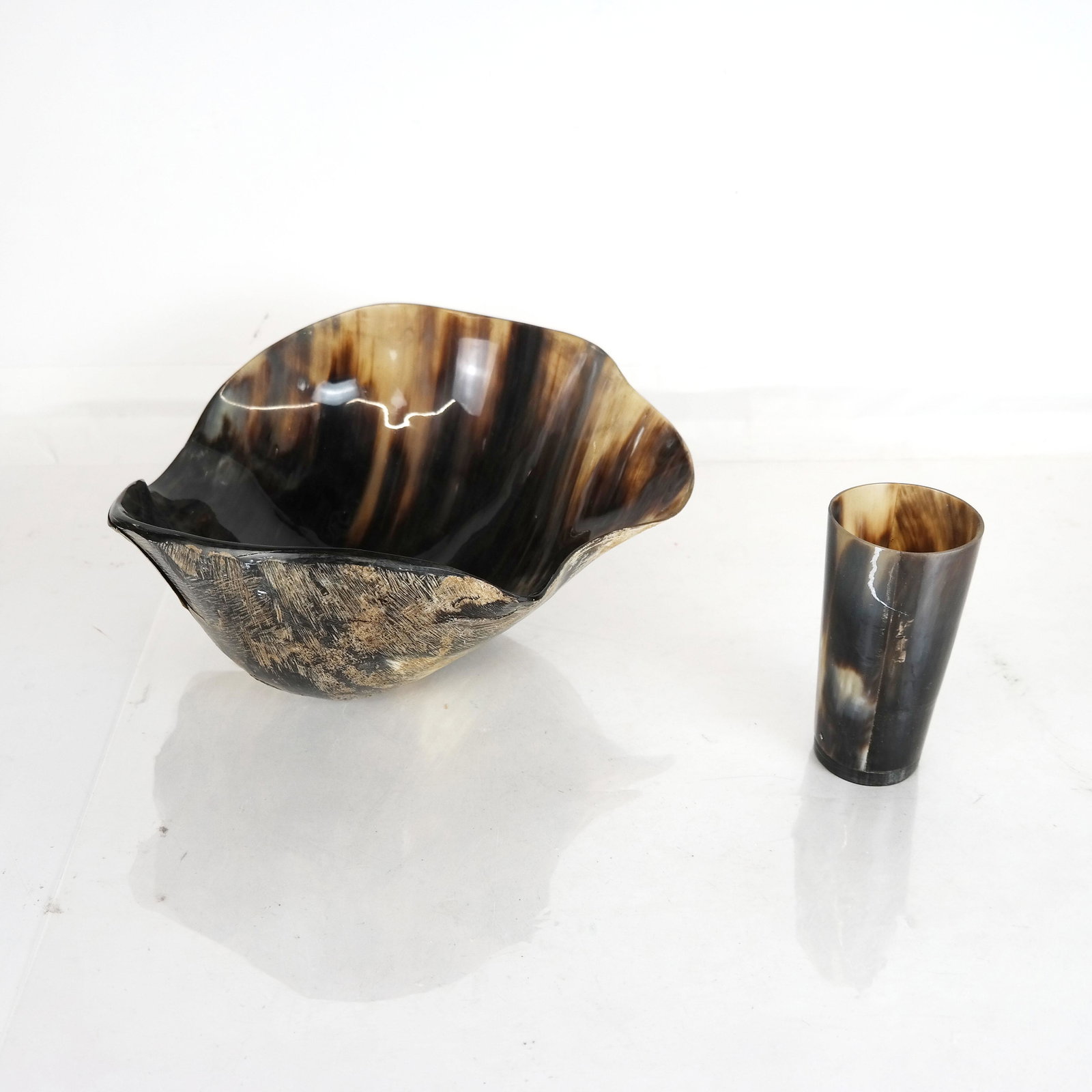 Horn Bowl and Beaker: Horn bowl and matching beaker. [Bowl: 4 1/4" H x 11" W x 10" D; Beaker: 5" H x 2 1/2" Diam.].