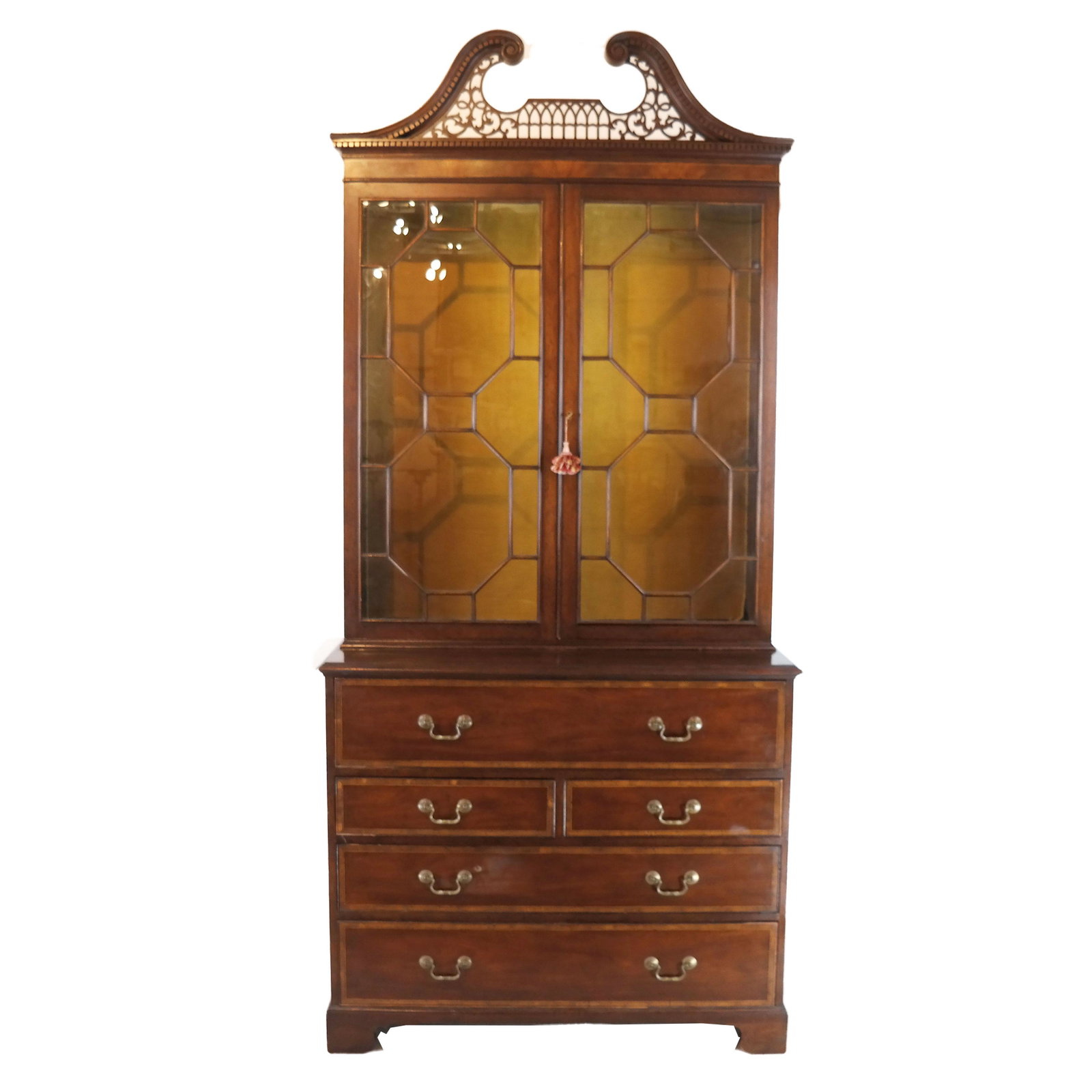 George III-Style Mahogany Secretary by Baker: Mahogany and walnut Chippendale-style secretary with drop-lid writing surface and matched drawer fronts of mahogany swirl veneer framed by satinwood cross banding; doors fitted with hand-set English c