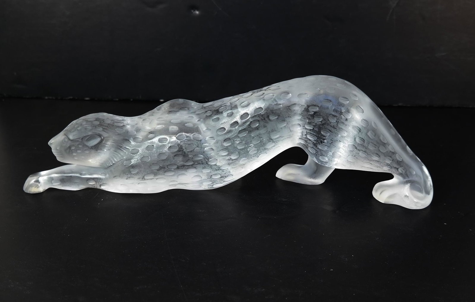Lalique, France Frosted Crystal Panther: Lalique, France crystal panther in original box. [Box: 5" H x 19 3/8" W x 7 1/2" D; Panther: 4" H x 14" W x 2 1/2" D]. In good condition; no chips or scratches.