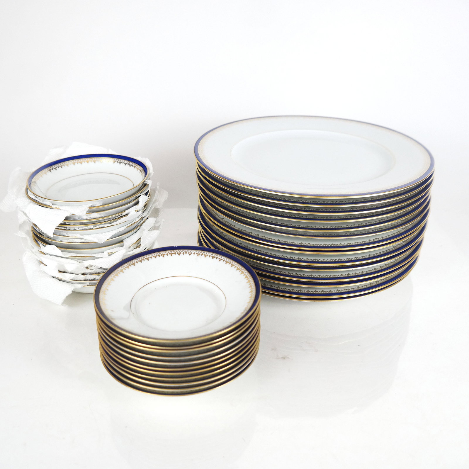 Towle Royal Limoges Porcelain Dinnerware: Group of Towle Royal Limoges porcelain in "Richelieu" pattern, comprising 14 dinner plates [10 1/2" Diam.], 11 shallow bowls [5 1/2" Diam.] and 15 fruit dishes [5" Diam.]. One with fleabite to rim.
