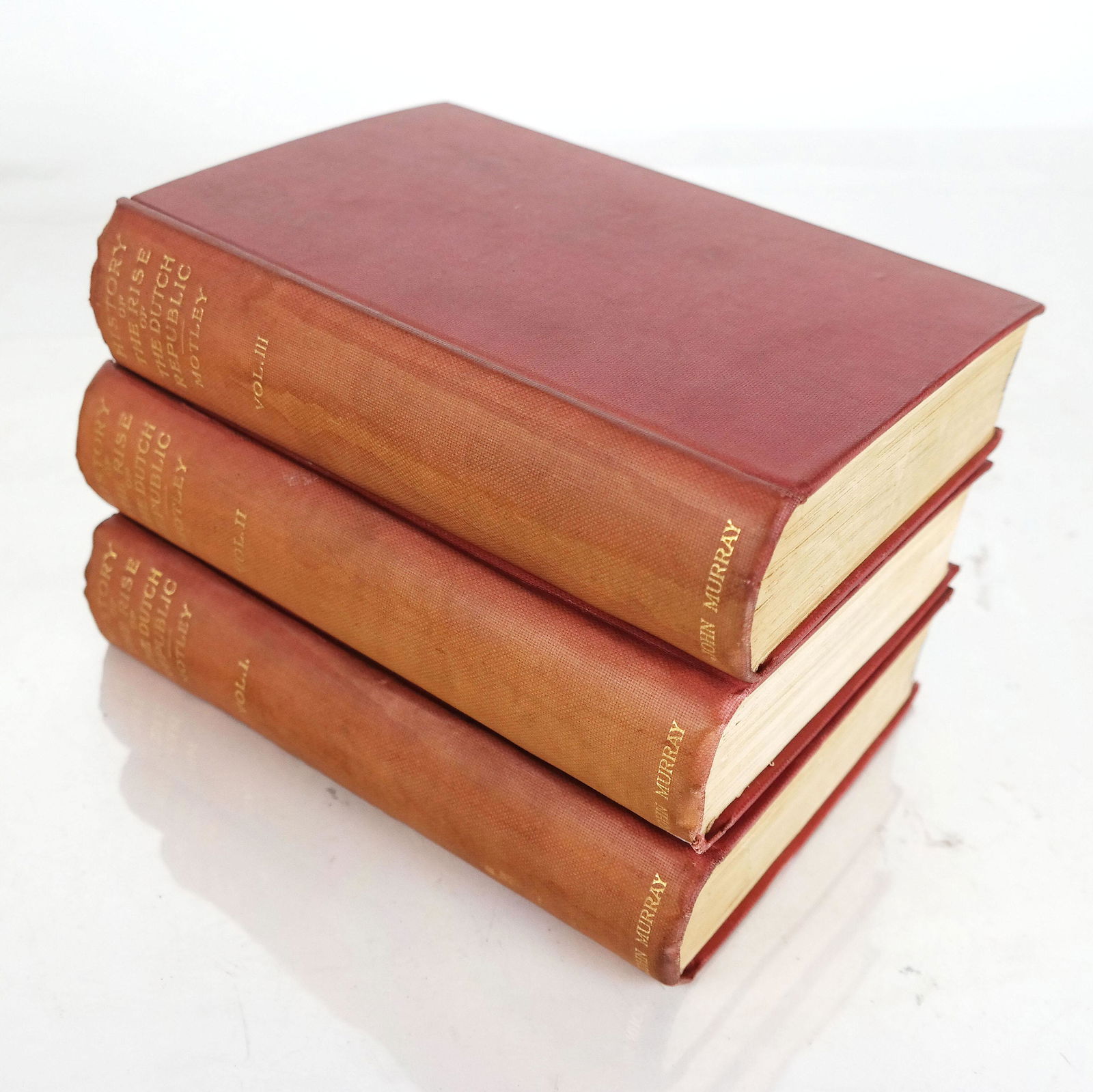 BOOKS: "Rise of the Dutch Republic" - 3 Vols.: "The Rise of the Dutch Republic: A History" by John Lothrop Motley, pub. John Murray, London, 1910. Small 4to, in three volumes. Linen bund with gilt stamped spines. [6 linear inches]. Wear with fadin