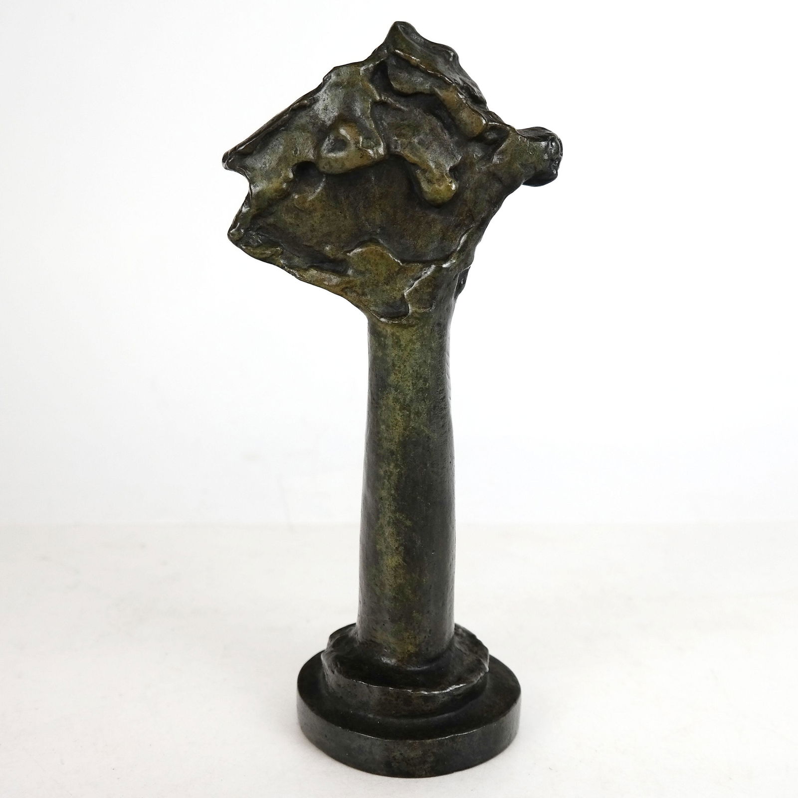 After Max WEBER: Abstract Bronze Sculpture: Russian sculpture of an abstract style profile, stamped underneath "Max Weber / 1959 / Roman Bronze Works". [8 7/8" H x 3" Diam.].