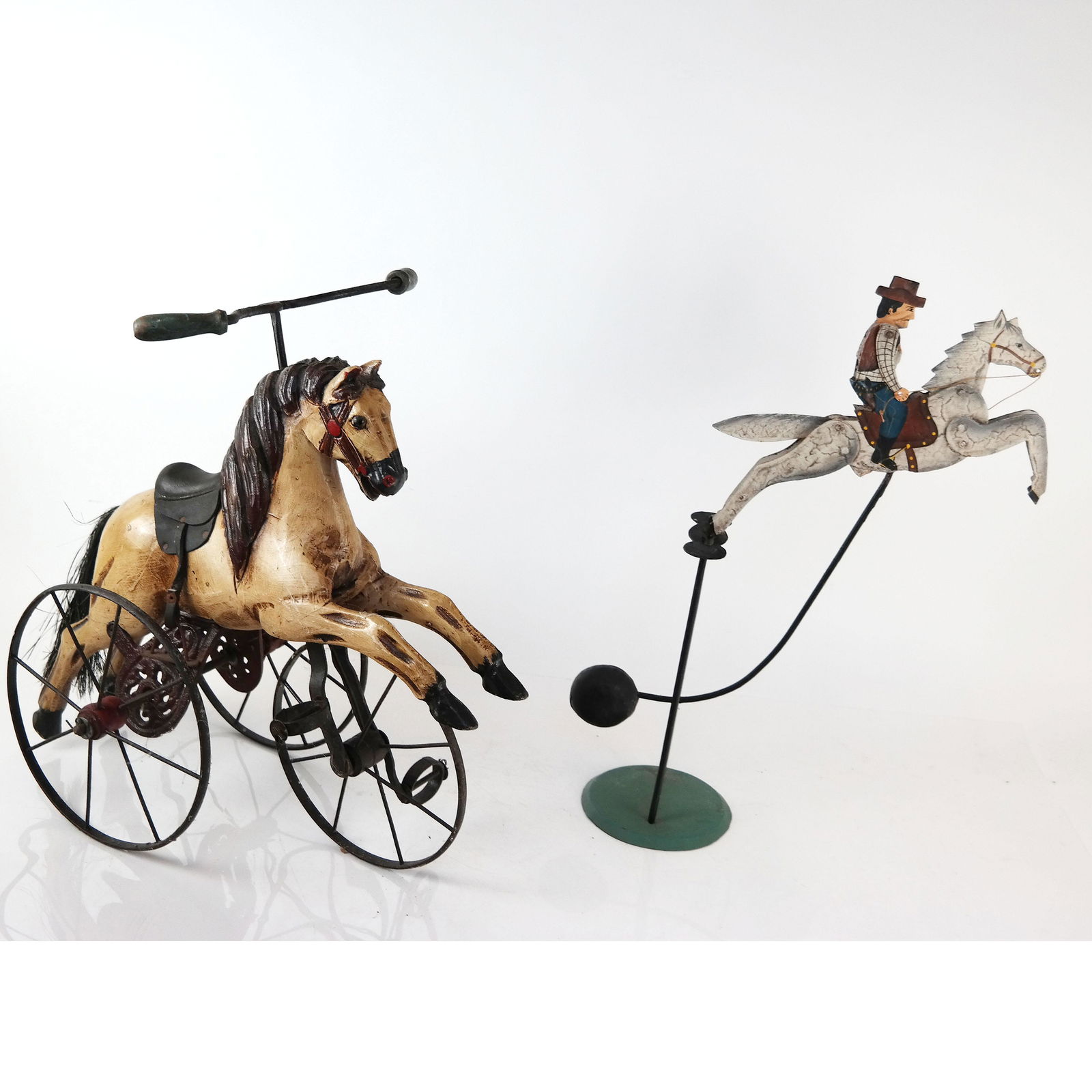 Two Reproduction Toys: Mini horse tricycle and a cowboy on a horse balancing toy. [Taller: 18" H]. In good condition.