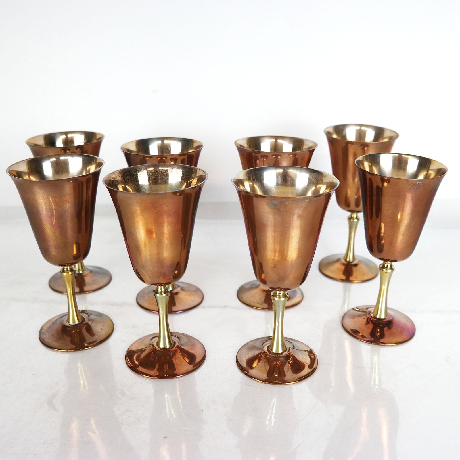 Set of 8 Copper Over Silver Goblets: Set of 8 copper over silver goblets, stamped "J. Bernal / Coppersmith". 51.895 ozt. [6 3/4" H].