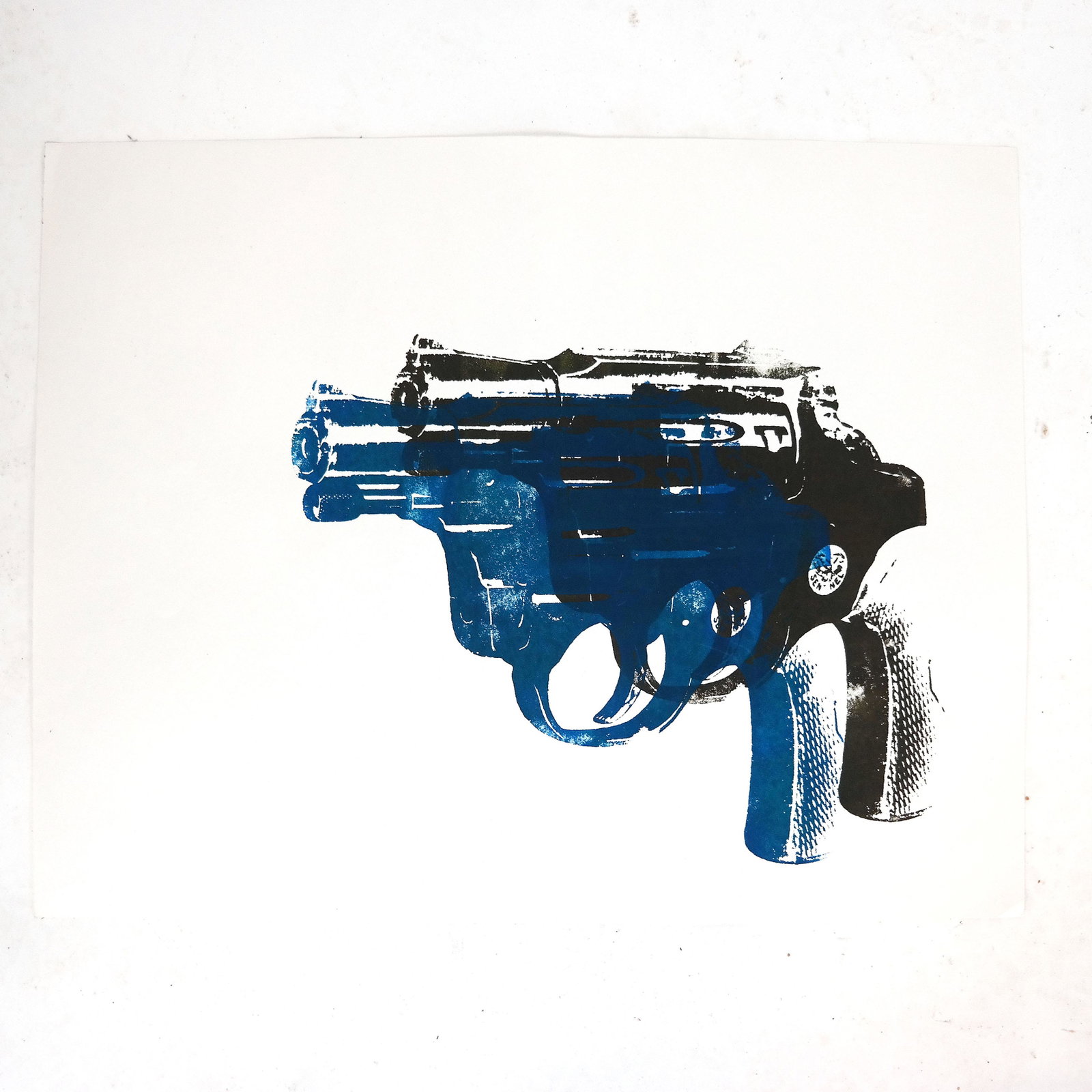 After Andy WARHOL: Gun - Silkscreen Print: Silkscreen print on wove paper of a gun, unframed, signed in pencil on verso. [Sheet: 22" H x 28" W]. In good condition.
