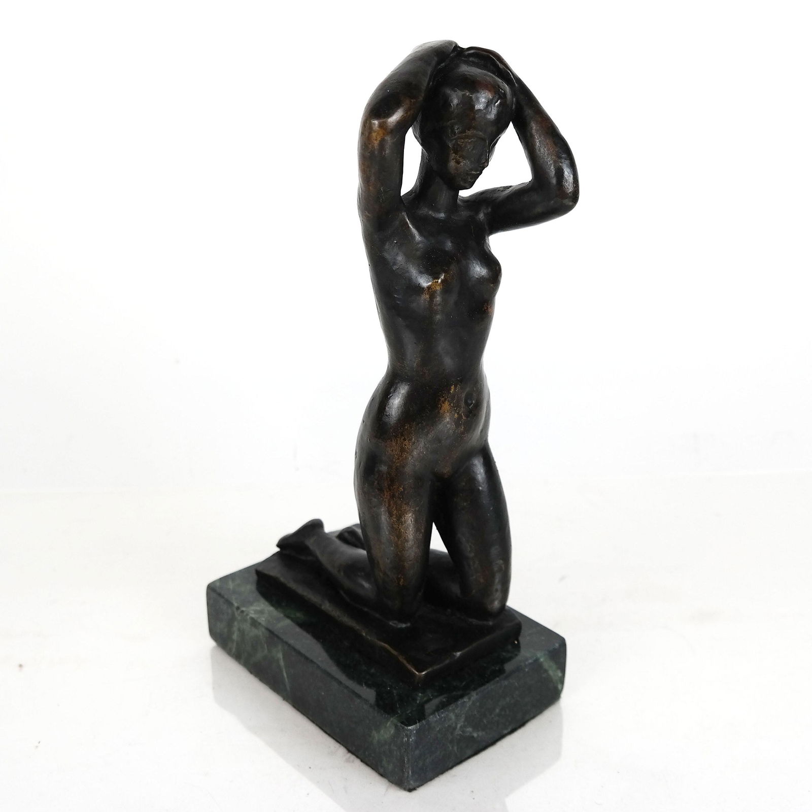 After Aristide MAILLOL: Nude - Sculpture: Bronze nude sculpture, in brown patina, on a green marble base, after Aristide Maillol (1861-1944). [10 3/4" H x 3 1/2" W x 5 1/2" D].
