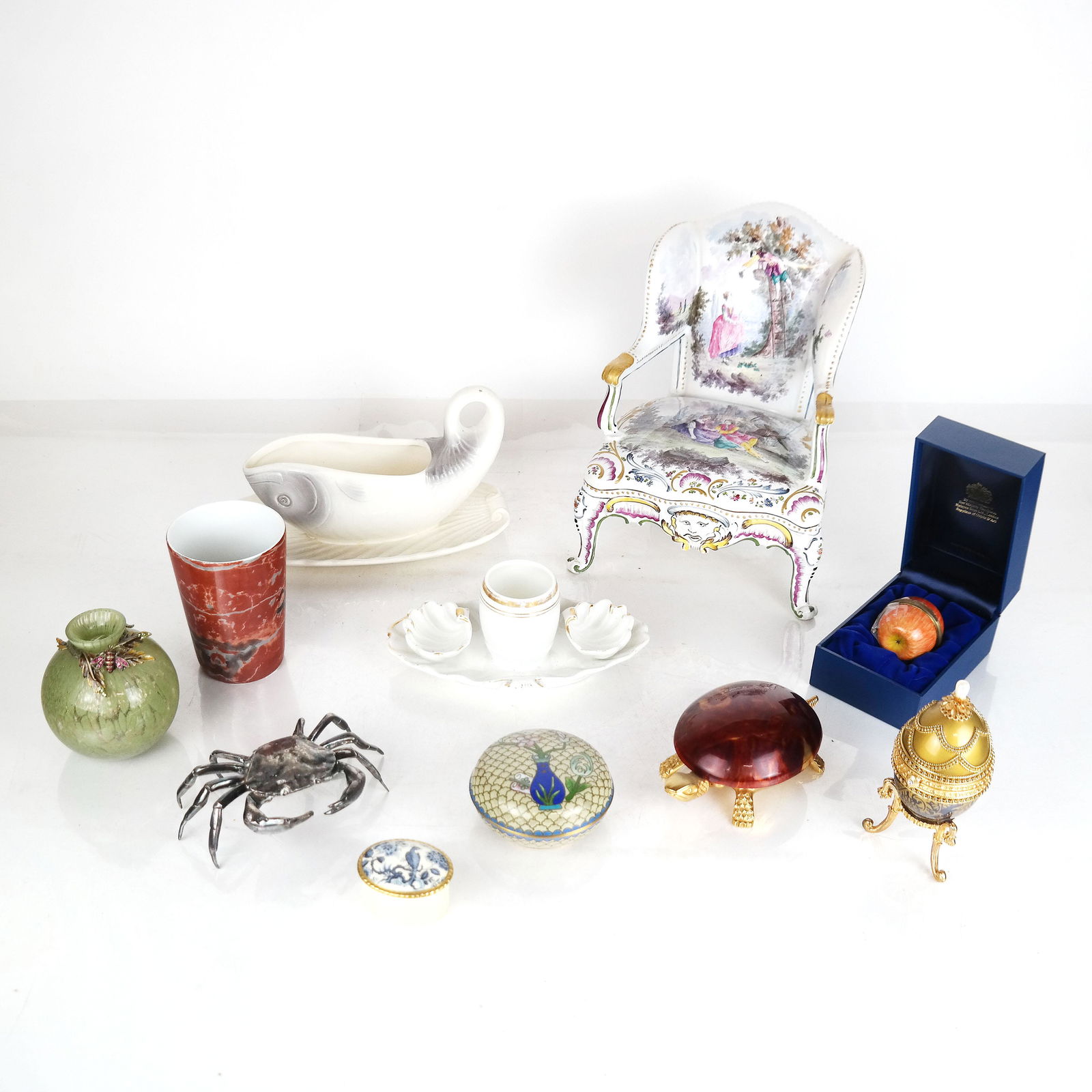 Assorted Decorative Table Accessories (12): Assorted group of twelve (12) decorative accessories includes egg-form ring box, porcelain chair, crab box, and others. Lot includes Japanese trinket dish shown in Photos #19 and #20. In good conditio